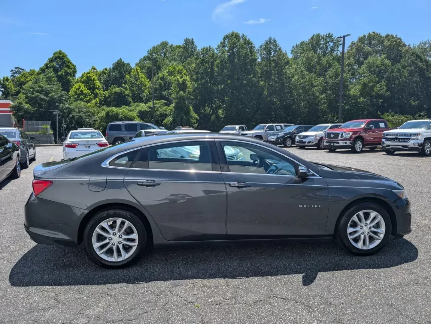 2016 /Jet Black Chevrolet Malibu LT (1G1ZE5ST7GF) with an Other engine, located at 5115 14th Ave., Columbus, GA, 31904, (706) 323-0345, 32.511494, -84.971046 - **Drive Toward Your Next Adventure with the 2016 Chevrolet Malibu LT at Gils Auto - Columbus!**<br /> <br /> Are you searching for the perfect blend of style, comfort, and performance for your daily commute or family outings? Look no further than this stunning 2016 Chevrolet Malibu LT, available now - Photo#3