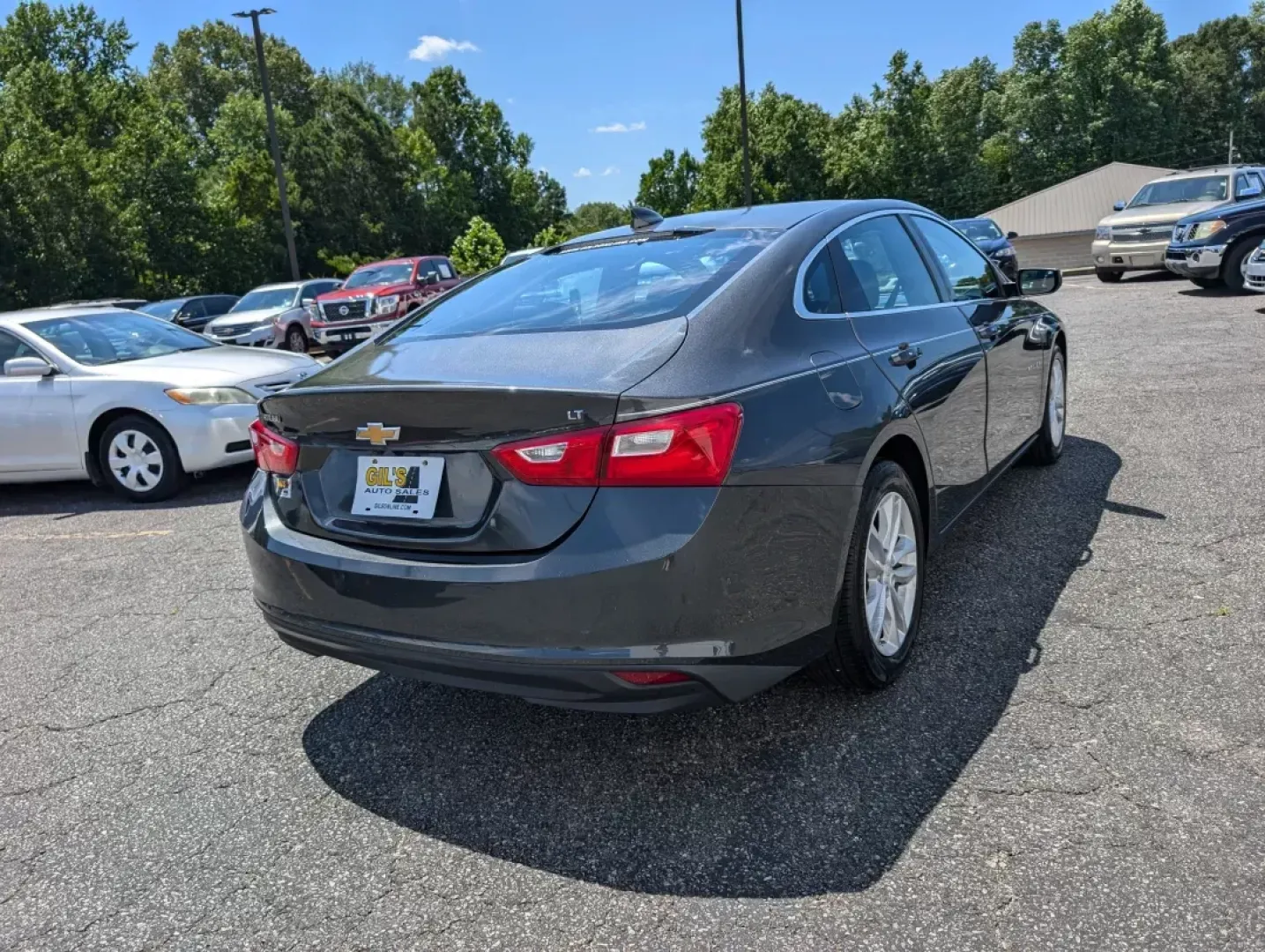 2016 /Jet Black Chevrolet Malibu LT (1G1ZE5ST7GF) with an Other engine, located at 5115 14th Ave., Columbus, GA, 31904, (706) 323-0345, 32.511494, -84.971046 - **Drive Toward Your Next Adventure with the 2016 Chevrolet Malibu LT at Gils Auto - Columbus!**<br /> <br /> Are you searching for the perfect blend of style, comfort, and performance for your daily commute or family outings? Look no further than this stunning 2016 Chevrolet Malibu LT, available now - Photo#4
