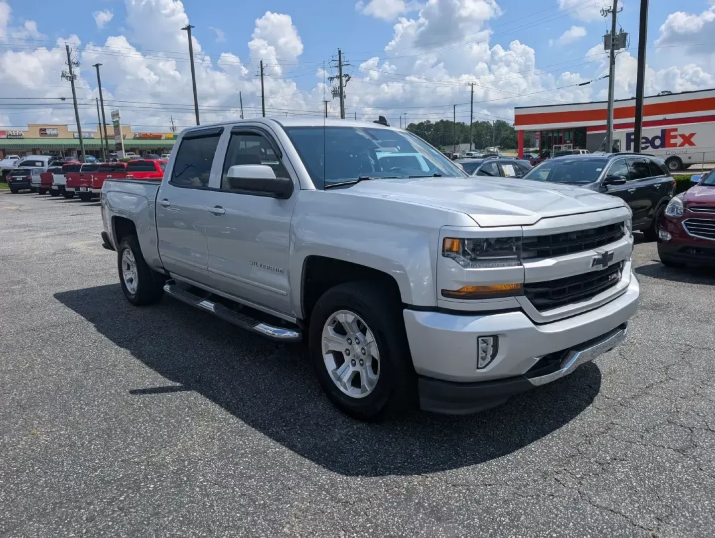 2016 /Jet Black Chevrolet Silverado 1500 LT (3GCUKRECXGG) with an Other engine, located at 3959 U.S. 80 W, Phenix City, AL, 36870, (334) 297-4885, 32.469296, -85.135185 - Discover the ultimate driving experience with this 2016 Chevrolet Silverado 1500 LT, perfect for those who crave adventure and reliability. Whether you're a growing family in need of a spacious and dependable vehicle or a weekend warrior looking to head off the beaten path, this truck has you covere - Photo#2