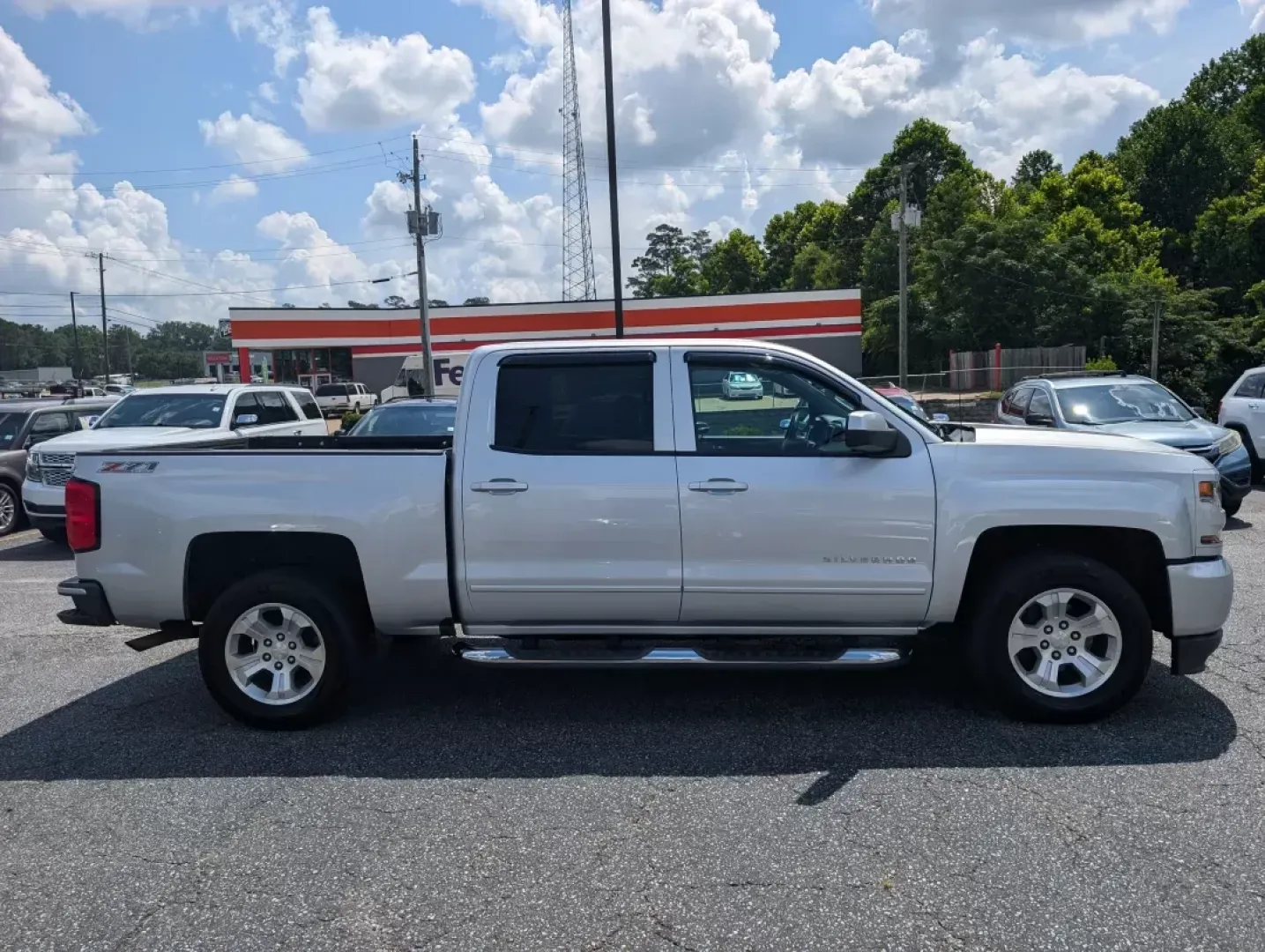 2016 /Jet Black Chevrolet Silverado 1500 LT (3GCUKRECXGG) with an Other engine, located at 3959 U.S. 80 W, Phenix City, AL, 36870, (334) 297-4885, 32.469296, -85.135185 - Discover the ultimate driving experience with this 2016 Chevrolet Silverado 1500 LT, perfect for those who crave adventure and reliability. Whether you're a growing family in need of a spacious and dependable vehicle or a weekend warrior looking to head off the beaten path, this truck has you covere - Photo#3