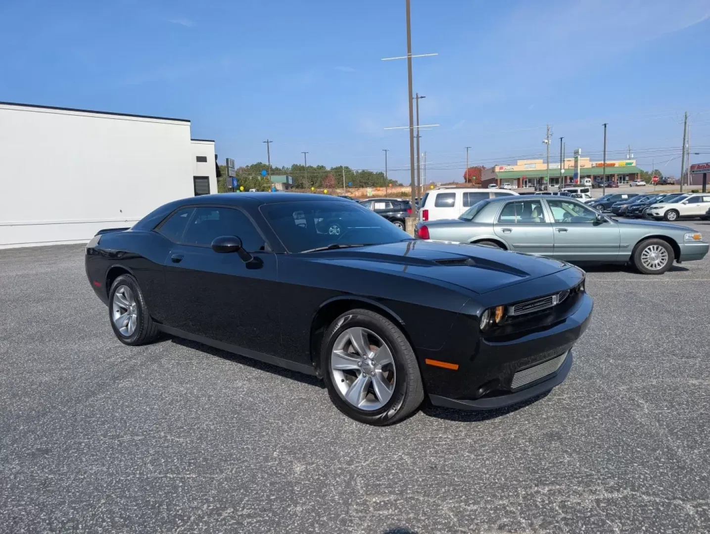 2016 /Black Dodge Challenger SXT (2C3CDZAG5GH) with an Other engine, located at 3959 U.S. 80 W, Phenix City, AL, 36870, (334) 297-4885, 32.469296, -85.135185 - Are you ready to ignite your driving experience? Step into the world of powerful performance and sleek design with our stunning 2016 Dodge Challenger SXT, available now at Gils Auto in Phenix City, AL. This 2-door coupe is not just a vehicle; it's an embodiment of style and muscle, perfect for those - Photo#2