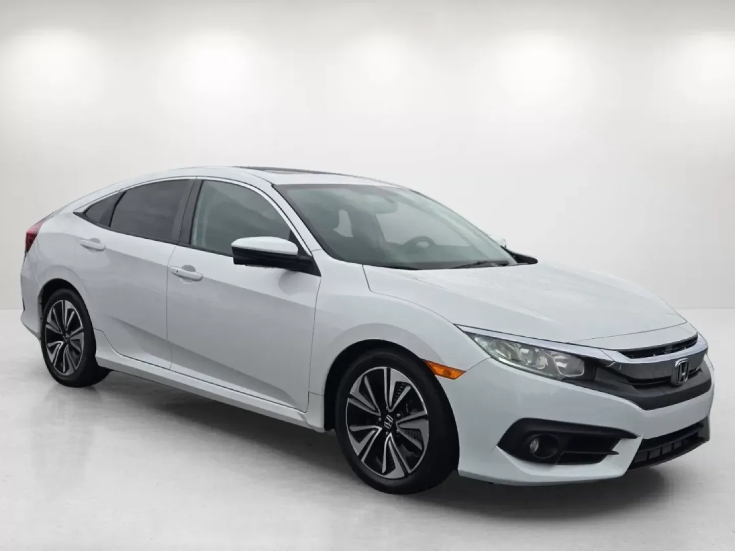 2016 Honda Civic Sedan EX-T (19XFC1F38GE) with an Other engine, located at 7000 Northlake Connector, Columbus, GA, 31904, (706) 987-8085, 32.524975, -84.978134 - **Unleash Your Driving Potential with the 2016 Honda Civic Sedan at Gils Auto!**<br /> <br /> Are you ready to elevate your daily commute and family outings to a whole new level? The 2016 Honda Civic Sedan EX-T is the perfect blend of reliability, style, and advanced features, making it an ideal cho - Photo#2