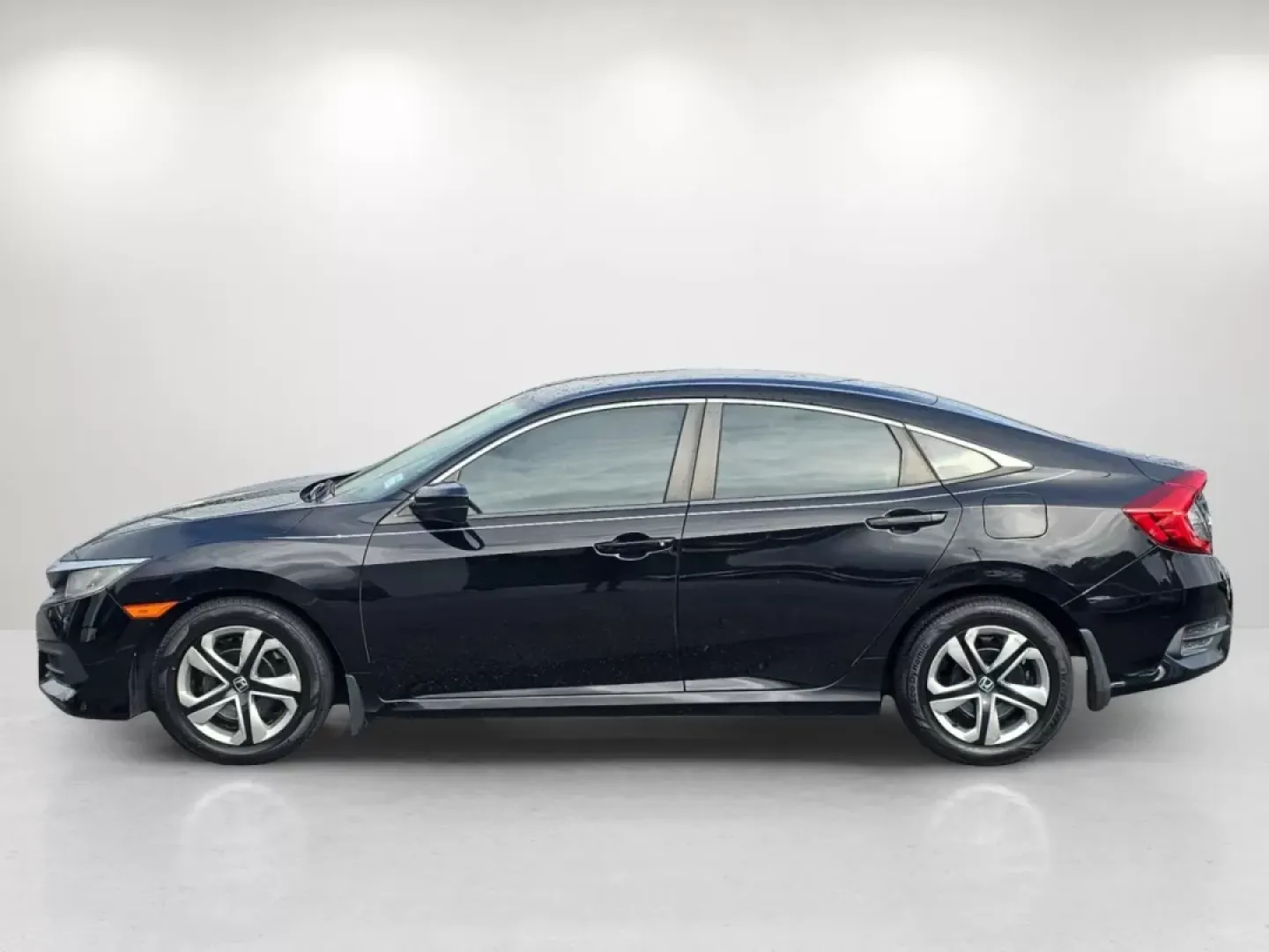 2016 Honda Civic Sedan LX (19XFC2F58GE) with an Other engine, located at 7000 Northlake Connector, Columbus, GA, 31904, (706) 987-8085, 32.524975, -84.978134 - Are you searching for a dependable and stylish sedan that can keep up with your busy lifestyle? Look no further! Gils Auto in Phenix City, AL, presents the perfect vehicle for you: a 2016 Honda Civic Sedan LX. This car is not just a mode of transportation; it's an essential companion for daily commu - Photo#7