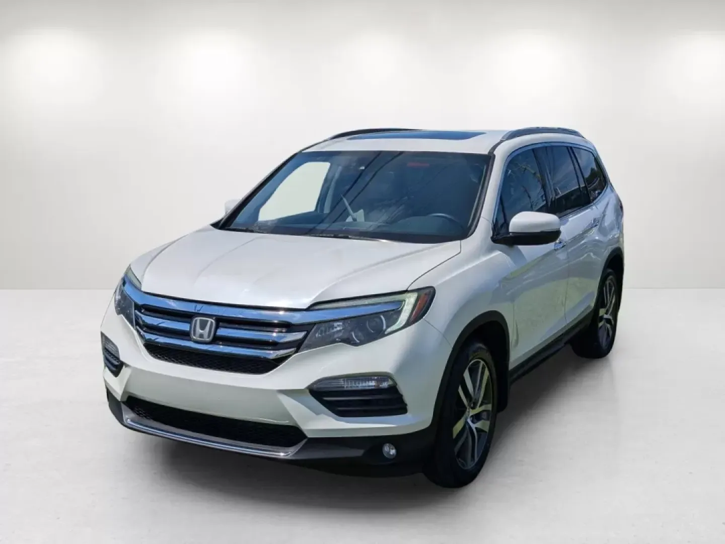 2016 Honda Pilot Elite (5FNYF6H07GB) with an Other engine, located at 3959 U.S. 80 W, Phenix City, AL, 36870, (334) 297-4885, 32.469296, -85.135185 - **Adventure Awaits with the 2016 Honda Pilot Elite - Perfect for Family Road Trips!**<br /> <br /> If you're searching for a reliable vehicle that combines comfort, style, and capability, look no further than the 2016 Honda Pilot Elite. This versatile SUV is designed for growing families and weekend - Photo#1