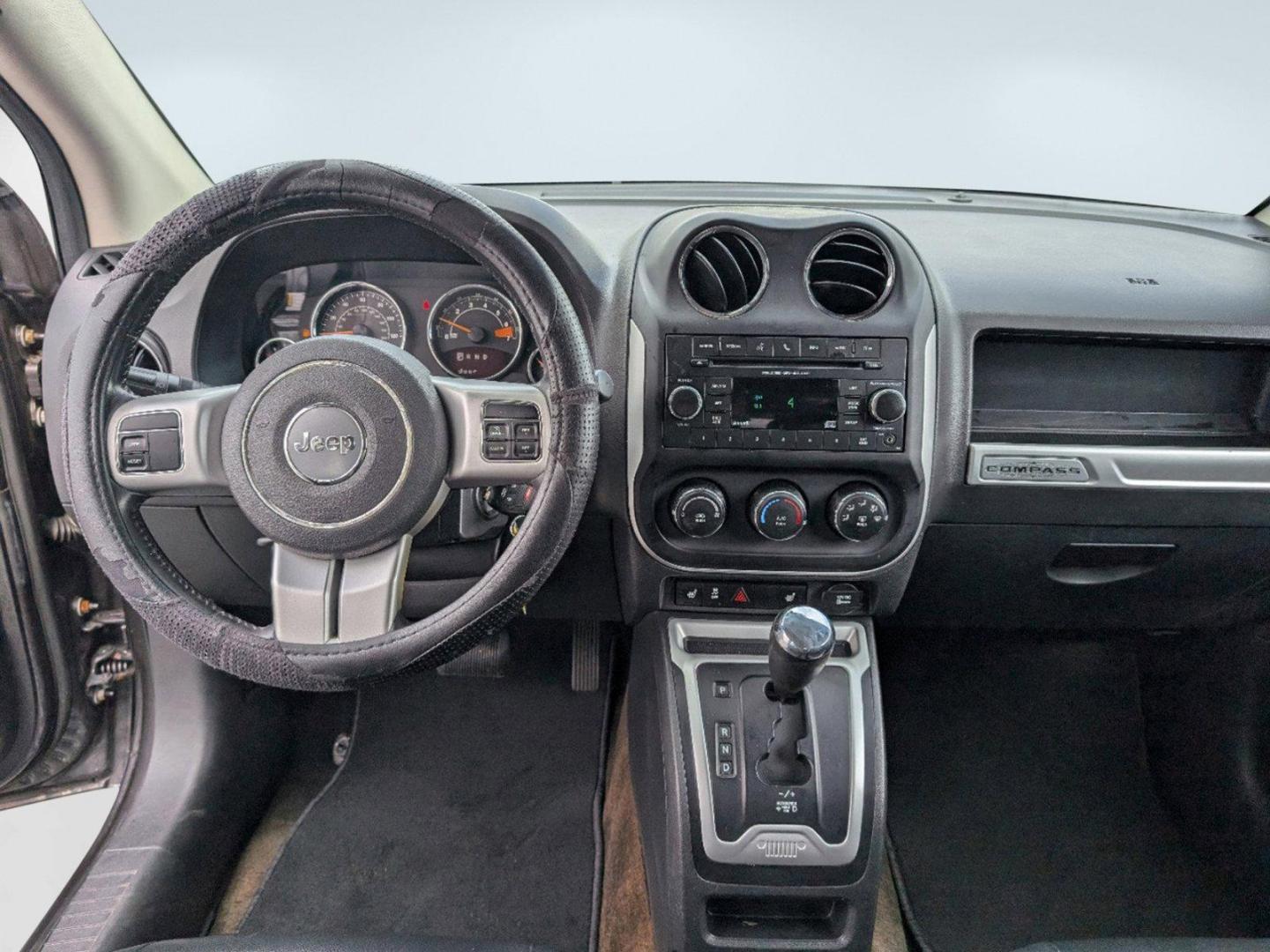 2016 /Dark Slate Gray Jeep Compass Latitude (1C4NJCEA9GD) with an Regular Unleaded I-4 2.0 L/122 engine, 1-Speed CVT w/OD transmission, located at 3959 U.S. 80 W, Phenix City, AL, 36870, (334) 297-4885, 32.469296, -85.135185 - 2016 Jeep Compass Latitude - Photo#13