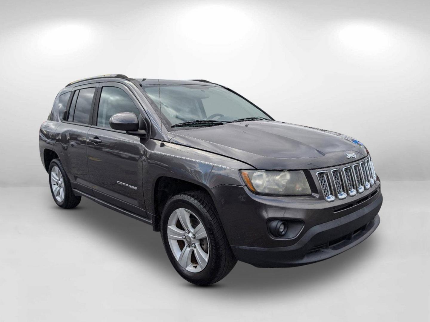 2016 /Dark Slate Gray Jeep Compass Latitude (1C4NJCEA9GD) with an Regular Unleaded I-4 2.0 L/122 engine, 1-Speed CVT w/OD transmission, located at 3959 U.S. 80 W, Phenix City, AL, 36870, (334) 297-4885, 32.469296, -85.135185 - 2016 Jeep Compass Latitude - Photo#4