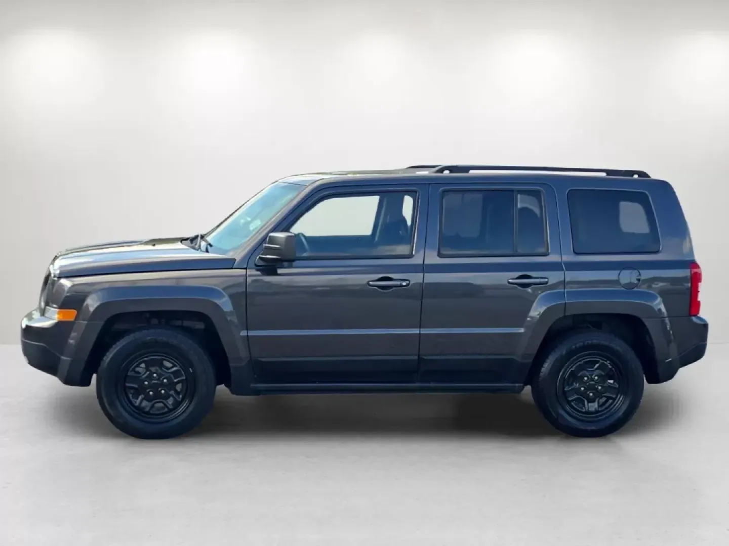 2016 /Dark Slate Gray Jeep Patriot Sport (1C4NJPBA2GD) with an Other engine, located at 804 22nd Ave, Phenix City, AL, 36870, (334) 297-1860, 32.484749, -85.024475 - Elevate your adventures with the unbeatable 2016 Jeep Patriot Sport, now available at Gils Auto in Phenix City, Alabama! This versatile SUV is perfect for weekend getaways, family road trips, or navigating your daily commute with ease. With its spacious interior and rugged build, the Jeep Patriot is - Photo#6