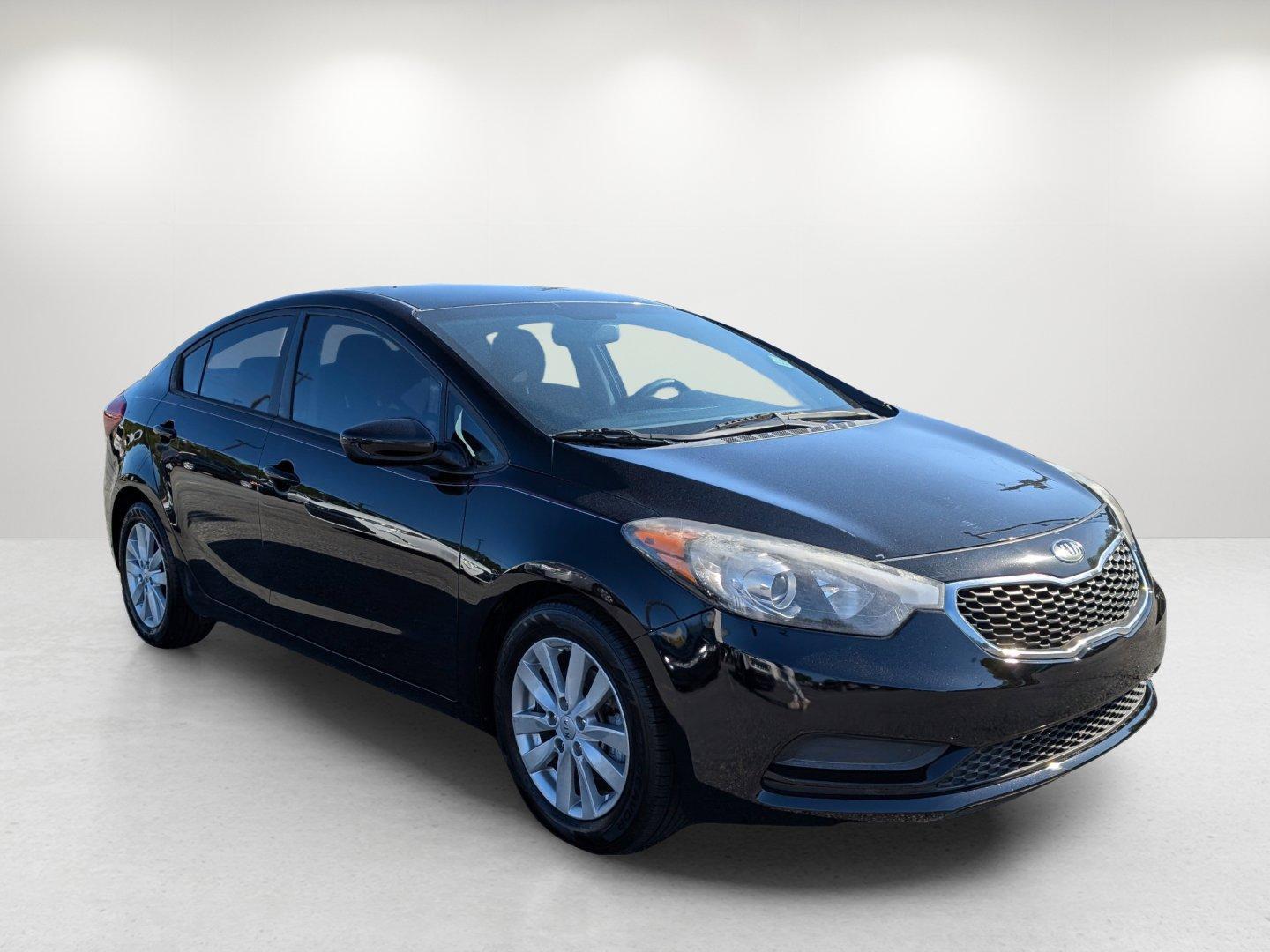 2016 /Black Kia Forte LX (KNAFX4A64G5) with an Regular Unleaded I-4 1.8 L/110 engine, 6-Speed Automatic w/OD transmission, located at 7000 Northlake Connector, Columbus, GA, 31904, (706) 987-8085, 32.524975, -84.978134 - 2016 Kia Forte LX - Photo#2