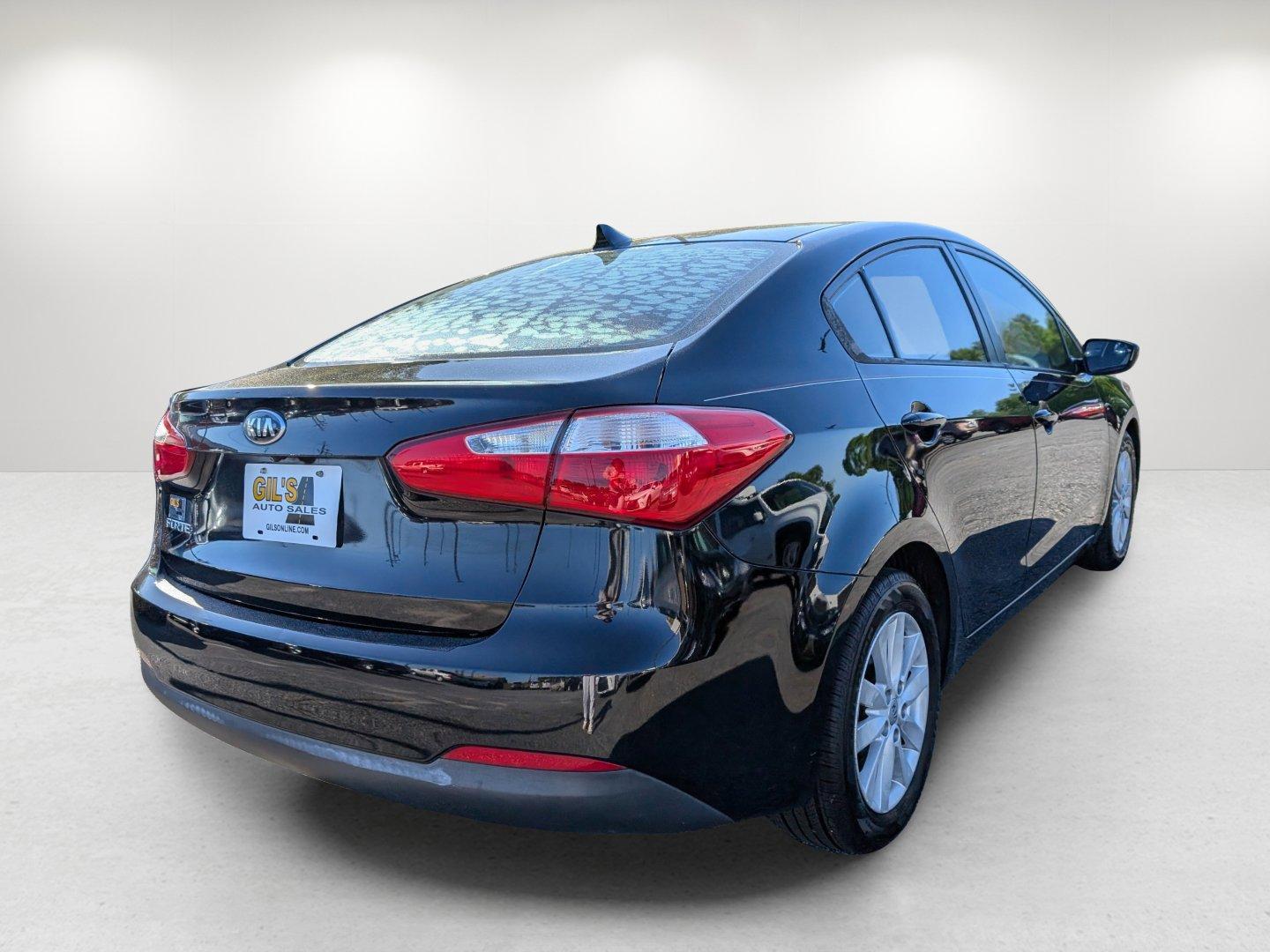 2016 /Black Kia Forte LX (KNAFX4A64G5) with an Regular Unleaded I-4 1.8 L/110 engine, 6-Speed Automatic w/OD transmission, located at 7000 Northlake Connector, Columbus, GA, 31904, (706) 987-8085, 32.524975, -84.978134 - 2016 Kia Forte LX - Photo#4
