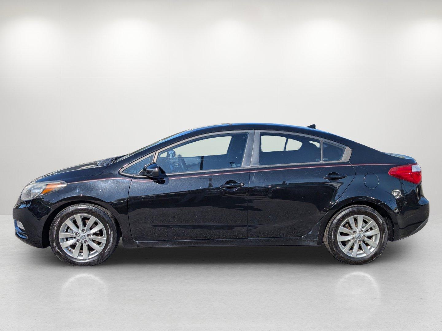 2016 /Black Kia Forte LX (KNAFX4A64G5) with an Regular Unleaded I-4 1.8 L/110 engine, 6-Speed Automatic w/OD transmission, located at 7000 Northlake Connector, Columbus, GA, 31904, (706) 987-8085, 32.524975, -84.978134 - 2016 Kia Forte LX - Photo#7