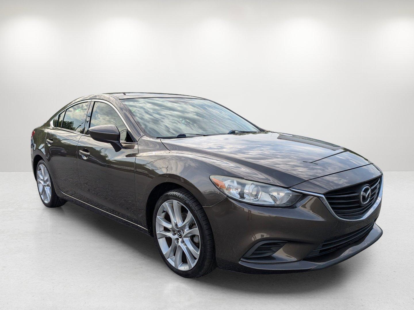 2016 /Black Mazda Mazda6 i Touring (JM1GJ1V58G1) with an Regular Unleaded I-4 2.5 L/152 engine, 6-Speed Automatic w/OD transmission, located at 804 22nd Ave, Phenix City, AL, 36870, (334) 297-1860, 32.484749, -85.024475 - 2016 Mazda Mazda6 i Touring - Photo#1