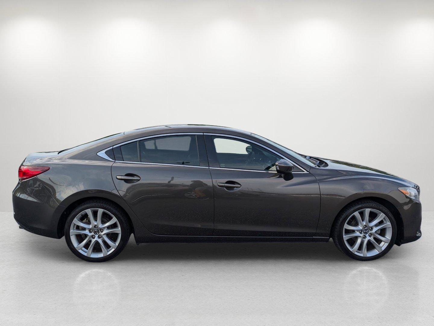 2016 /Black Mazda Mazda6 i Touring (JM1GJ1V58G1) with an Regular Unleaded I-4 2.5 L/152 engine, 6-Speed Automatic w/OD transmission, located at 804 22nd Ave, Phenix City, AL, 36870, (334) 297-1860, 32.484749, -85.024475 - 2016 Mazda Mazda6 i Touring - Photo#2