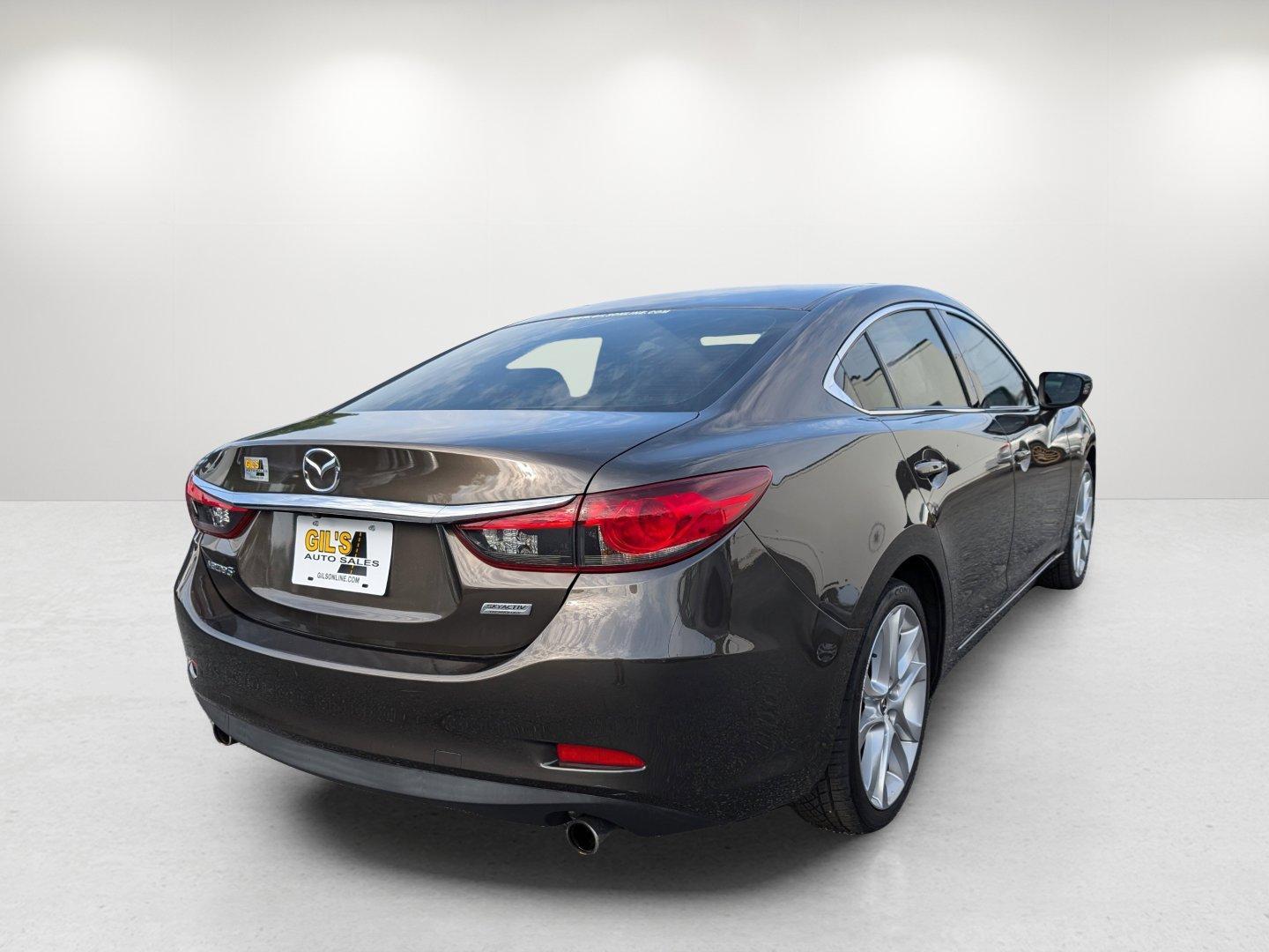 2016 /Black Mazda Mazda6 i Touring (JM1GJ1V58G1) with an Regular Unleaded I-4 2.5 L/152 engine, 6-Speed Automatic w/OD transmission, located at 804 22nd Ave, Phenix City, AL, 36870, (334) 297-1860, 32.484749, -85.024475 - 2016 Mazda Mazda6 i Touring - Photo#3