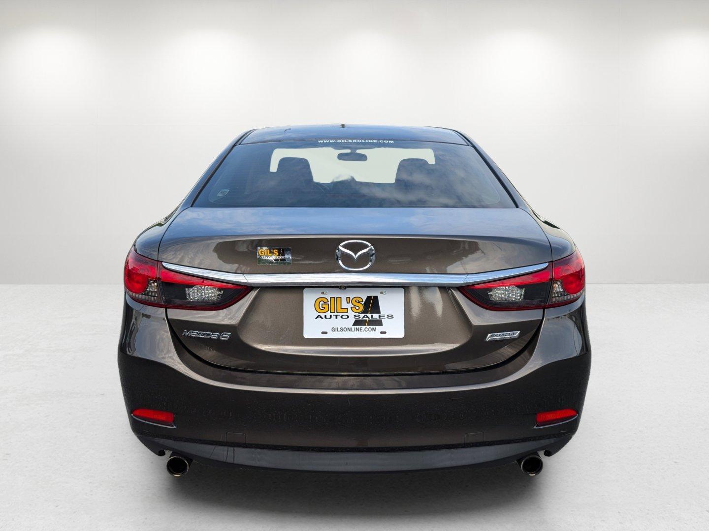 2016 /Black Mazda Mazda6 i Touring (JM1GJ1V58G1) with an Regular Unleaded I-4 2.5 L/152 engine, 6-Speed Automatic w/OD transmission, located at 804 22nd Ave, Phenix City, AL, 36870, (334) 297-1860, 32.484749, -85.024475 - 2016 Mazda Mazda6 i Touring - Photo#4