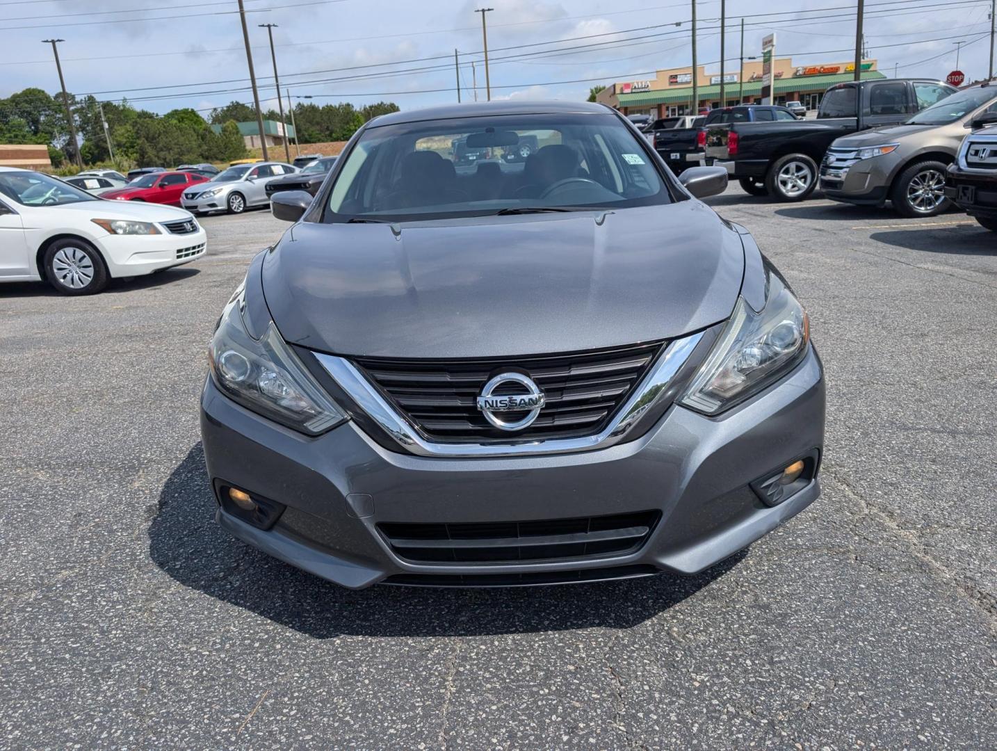 2016 /Charcoal Nissan Altima 2.5 SR (1N4AL3AP5GC) with an Regular Unleaded I-4 2.5 L/152 engine, 1-Speed CVT w/OD transmission, located at 3959 U.S. 80 W, Phenix City, AL, 36870, (334) 297-4885, 32.469296, -85.135185 - 2016 Nissan Altima 2.5 SR - Photo#2