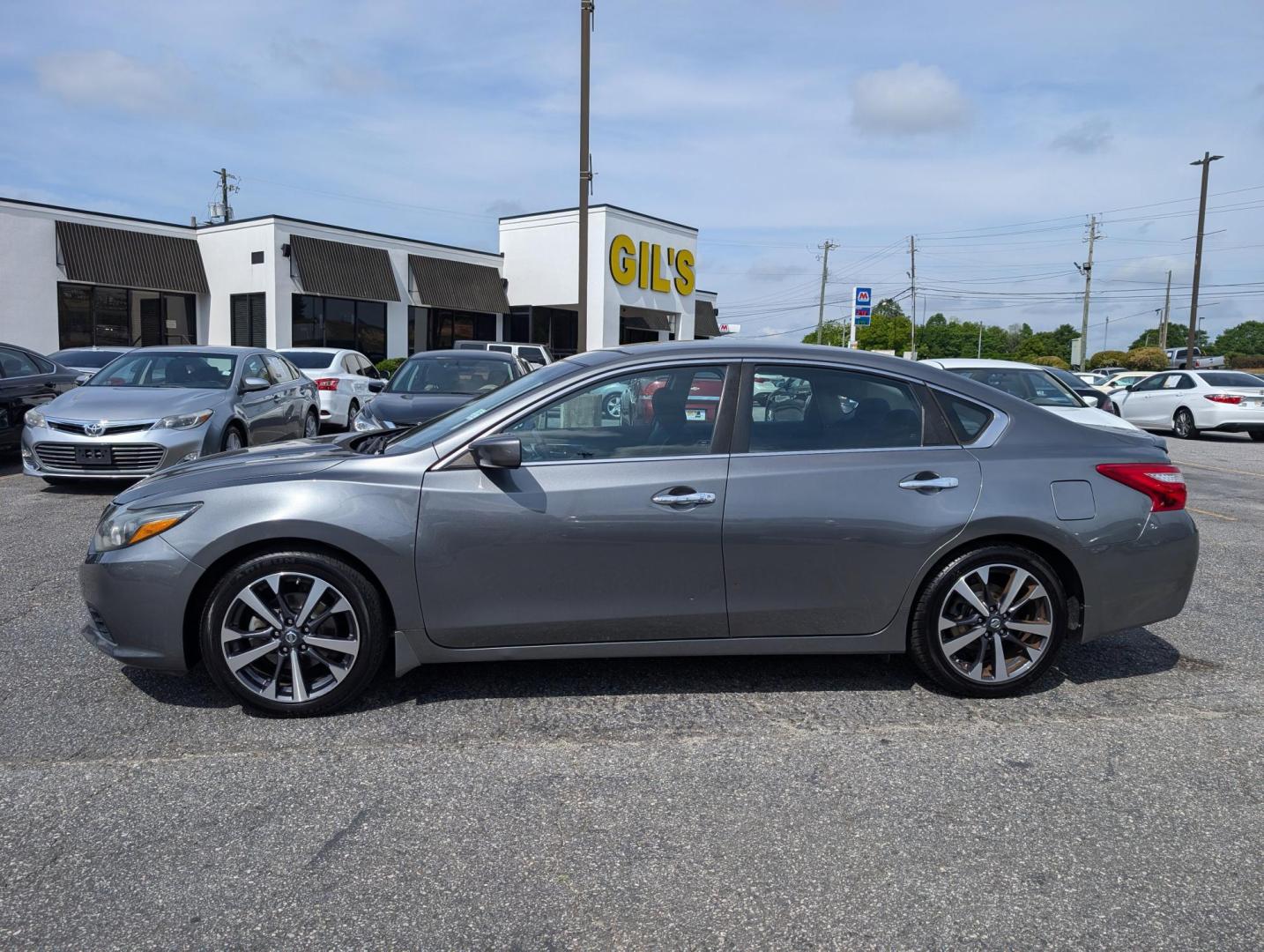 2016 /Charcoal Nissan Altima 2.5 SR (1N4AL3AP5GC) with an Regular Unleaded I-4 2.5 L/152 engine, 1-Speed CVT w/OD transmission, located at 3959 U.S. 80 W, Phenix City, AL, 36870, (334) 297-4885, 32.469296, -85.135185 - 2016 Nissan Altima 2.5 SR - Photo#8