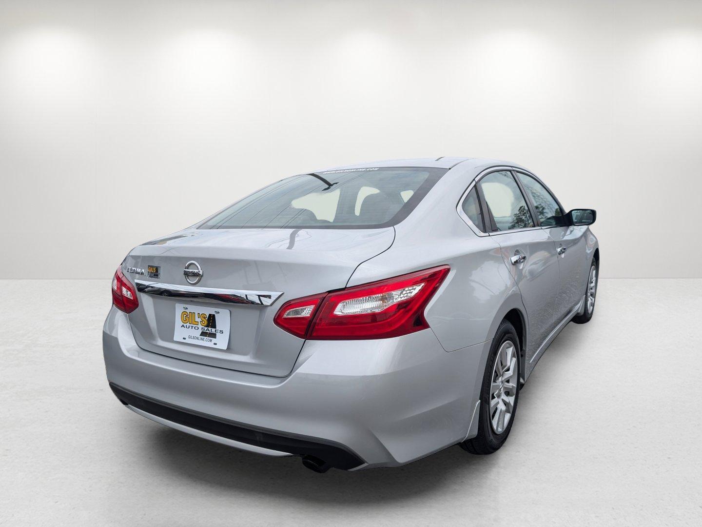 2016 /Charcoal Nissan Altima 2.5 S (1N4AL3AP9GN) with an Regular Unleaded I-4 2.5 L/152 engine, 1-Speed CVT w/OD transmission, located at 804 22nd Ave, Phenix City, AL, 36870, (334) 297-1860, 32.484749, -85.024475 - 2016 Nissan Altima 2.5 S - Photo#4