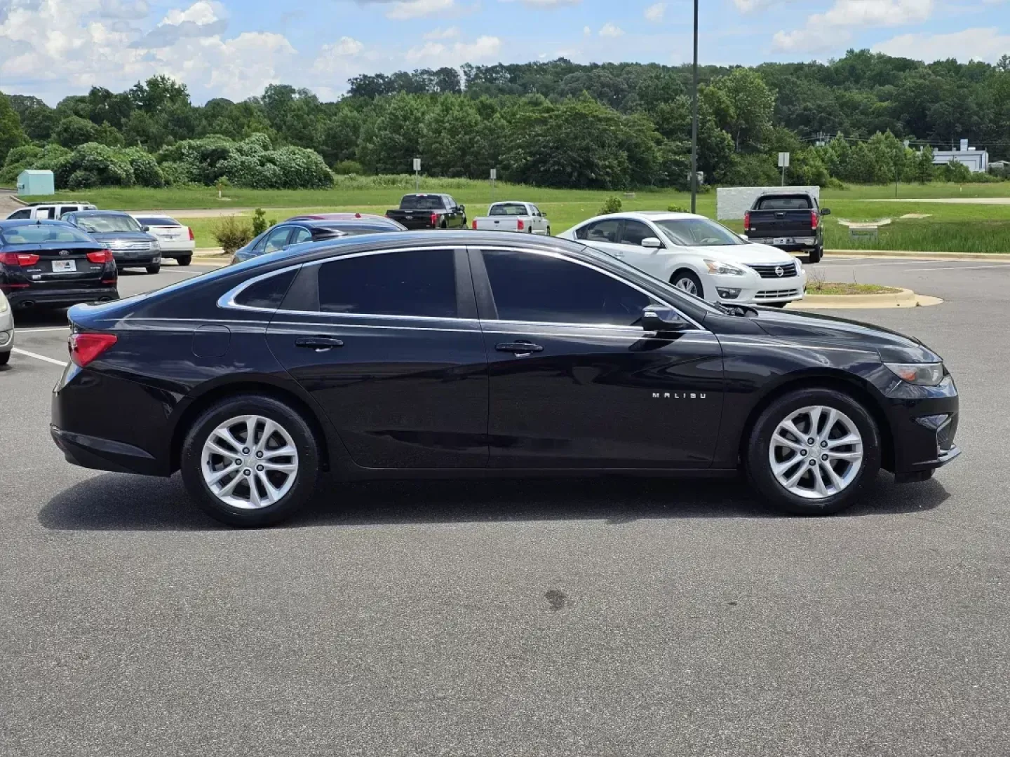 2017 /Jet Black Chevrolet Malibu LT (1G1ZE5ST2HF) with an Other engine, located at 521 Old Farm Lane Rd, Prattville, AL, 36066, (334) 325-1505, 32.482460, -86.416367 - **Discover Your Perfect Ride with Gils Auto - Prattville: 2017 Chevrolet Malibu LT**<br /> <br /> Are you in search of a reliable vehicle that effortlessly complements your busy lifestyle? Look no further than this striking 2017 Chevrolet Malibu LT, available now at Gils Auto in Prattville, AL. Perf - Photo#3