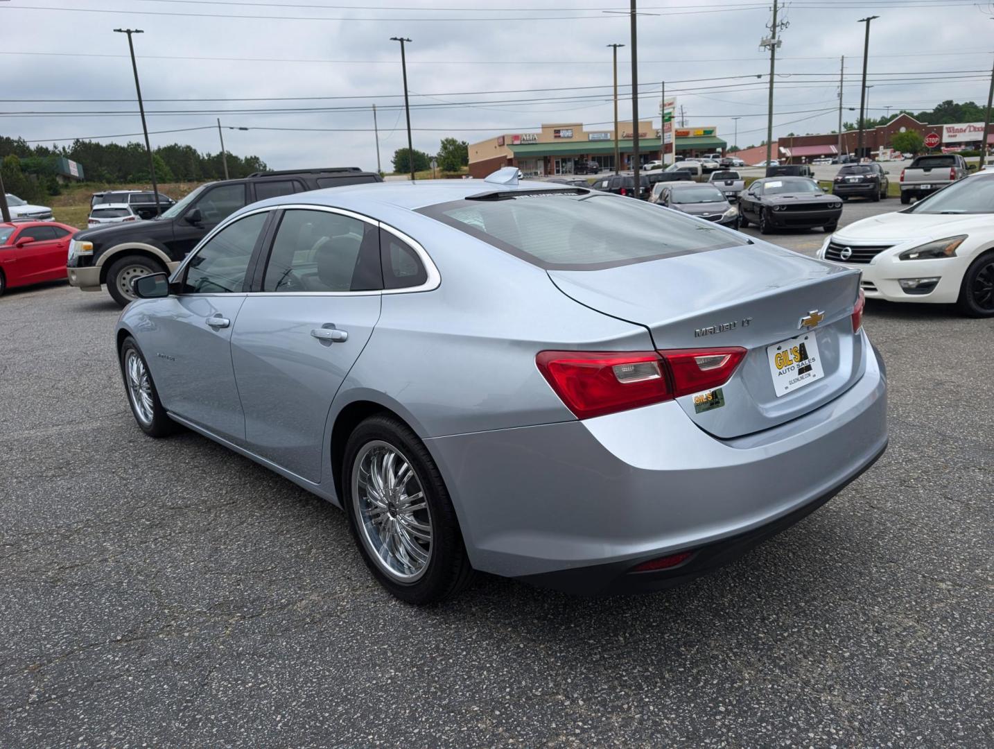2017 /Jet Black Chevrolet Malibu LT (1G1ZE5ST9HF) with an Turbocharged Gas I4 1.5L/91 engine, 6-Speed Automatic transmission, located at 3959 U.S. 80 W, Phenix City, AL, 36870, (334) 297-4885, 32.469296, -85.135185 - 2017 Chevrolet Malibu LT - Photo#5