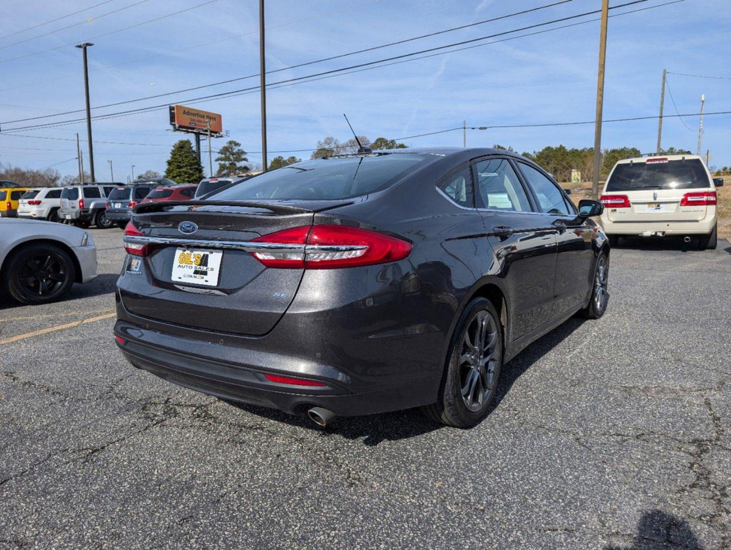 2017 Ford Fusion SE (3FA6P0H77HR) with an Regular Unleaded I-4 2.5 L/152 engine, 6-Speed Automatic w/OD transmission, located at 3959 U.S. 80 W, Phenix City, AL, 36870, (334) 297-4885, 32.469296, -85.135185 - 2017 Ford Fusion SE - Photo#5