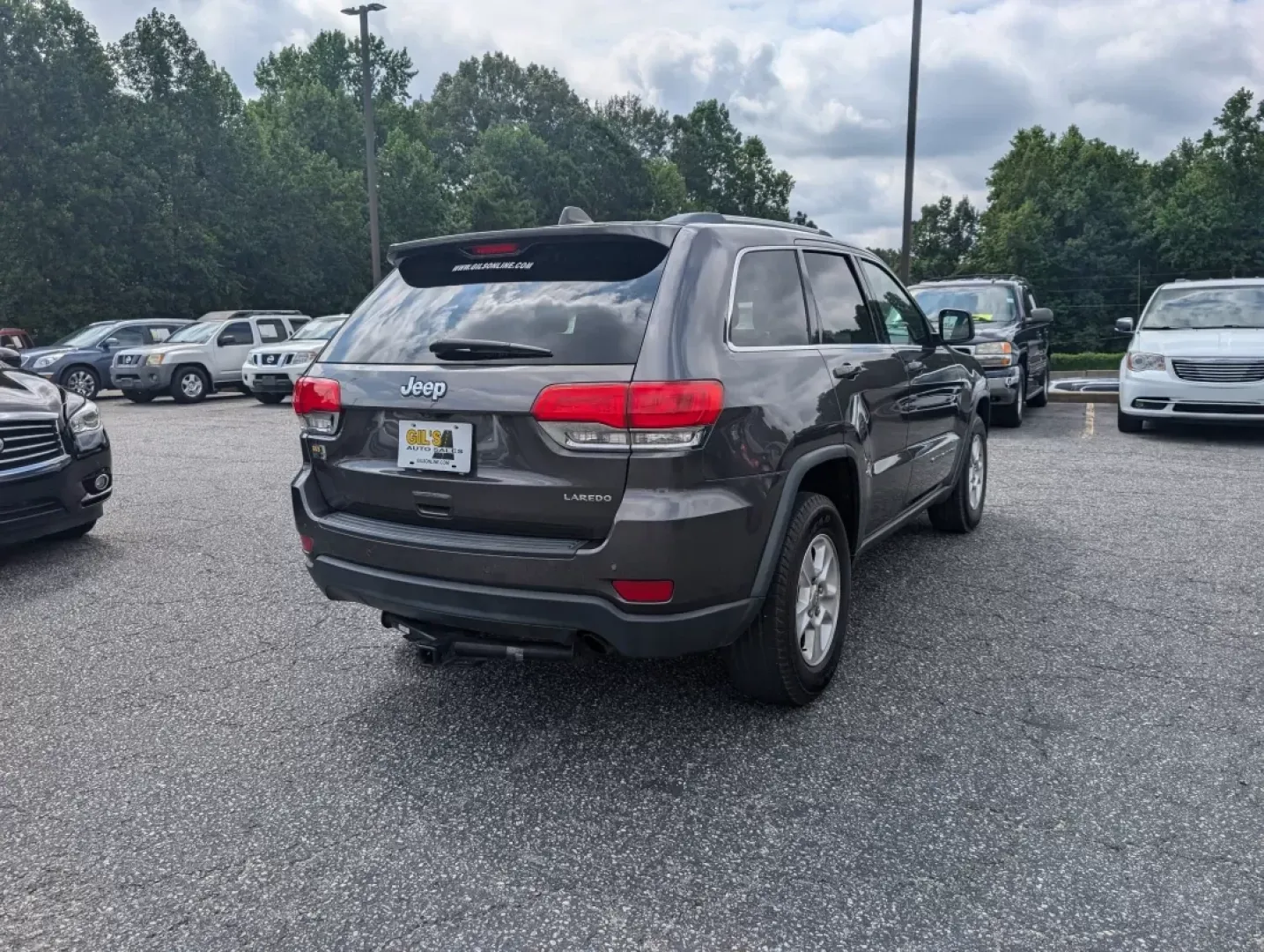 2017 /Black Jeep Grand Cherokee Laredo (1C4RJEAG0HC) with an Other engine, located at 3959 U.S. 80 W, Phenix City, AL, 36870, (334) 297-4885, 32.469296, -85.135185 - Experience the ultimate blend of comfort and capability in this 2017 Jeep Grand Cherokee Laredo, now available at Gils Auto in Phenix City, AL. Whether you're commuting through the bustling streets of downtown, tackling weekend getaways, or embarking on family road trips, this SUV is designed to ele - Photo#4