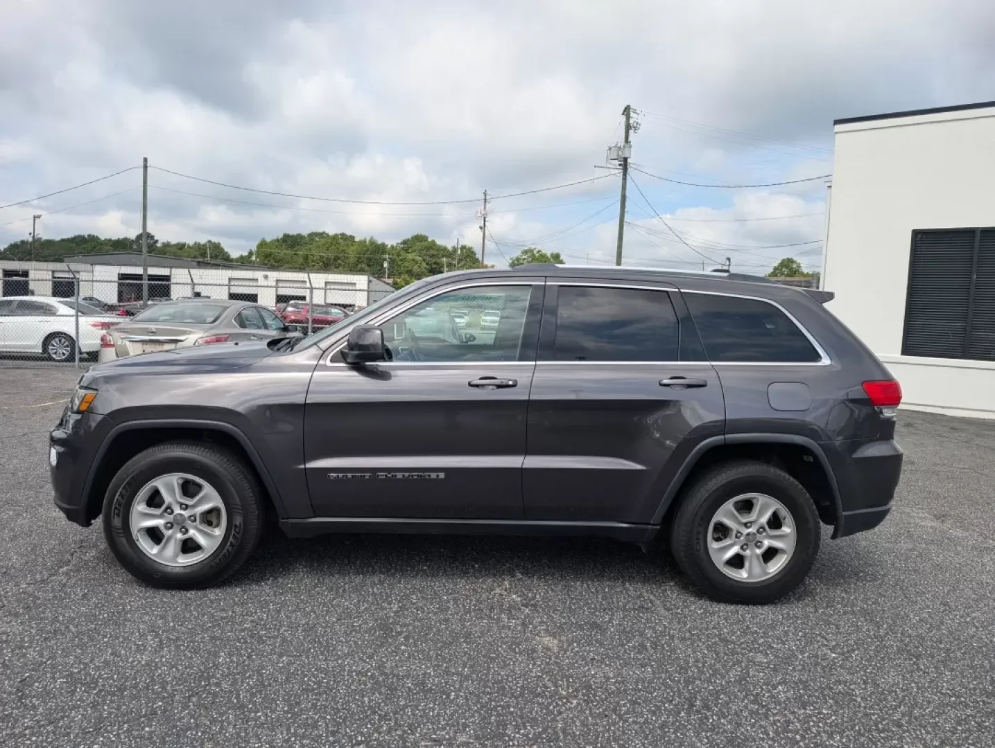 2017 /Black Jeep Grand Cherokee Laredo (1C4RJEAG0HC) with an Other engine, located at 3959 U.S. 80 W, Phenix City, AL, 36870, (334) 297-4885, 32.469296, -85.135185 - Experience the ultimate blend of comfort and capability in this 2017 Jeep Grand Cherokee Laredo, now available at Gils Auto in Phenix City, AL. Whether you're commuting through the bustling streets of downtown, tackling weekend getaways, or embarking on family road trips, this SUV is designed to ele - Photo#7