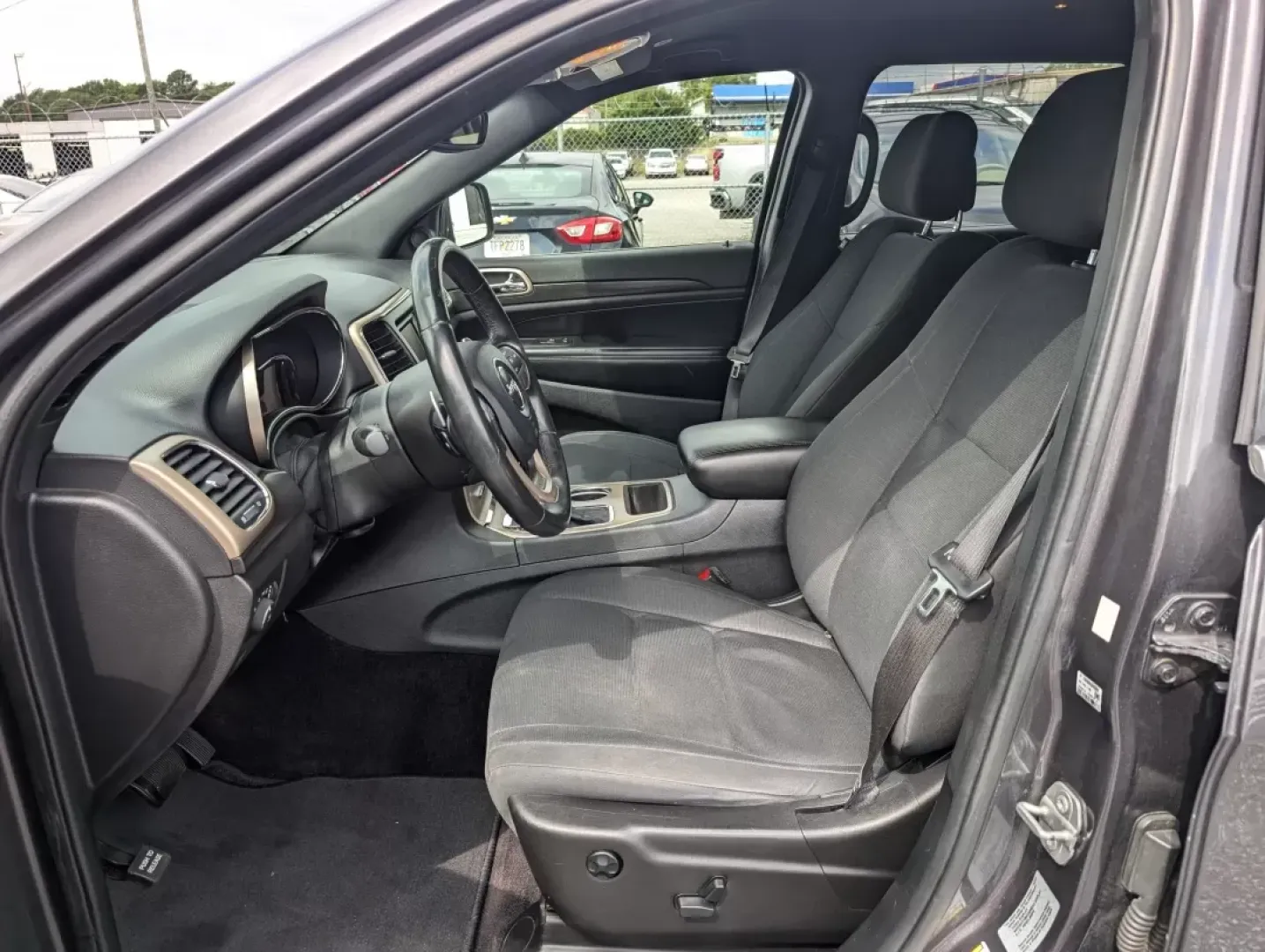 2017 /Black Jeep Grand Cherokee Laredo (1C4RJEAG0HC) with an Other engine, located at 3959 U.S. 80 W, Phenix City, AL, 36870, (334) 297-4885, 32.469296, -85.135185 - Experience the ultimate blend of comfort and capability in this 2017 Jeep Grand Cherokee Laredo, now available at Gils Auto in Phenix City, AL. Whether you're commuting through the bustling streets of downtown, tackling weekend getaways, or embarking on family road trips, this SUV is designed to ele - Photo#9