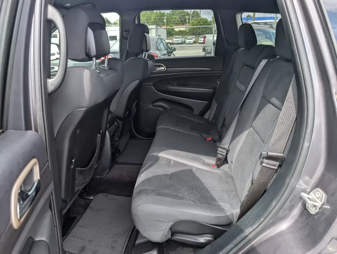 2017 /Black Jeep Grand Cherokee Laredo (1C4RJEAG0HC) with an Other engine, located at 3959 U.S. 80 W, Phenix City, AL, 36870, (334) 297-4885, 32.469296, -85.135185 - Experience the ultimate blend of comfort and capability in this 2017 Jeep Grand Cherokee Laredo, now available at Gils Auto in Phenix City, AL. Whether you're commuting through the bustling streets of downtown, tackling weekend getaways, or embarking on family road trips, this SUV is designed to ele - Photo#10