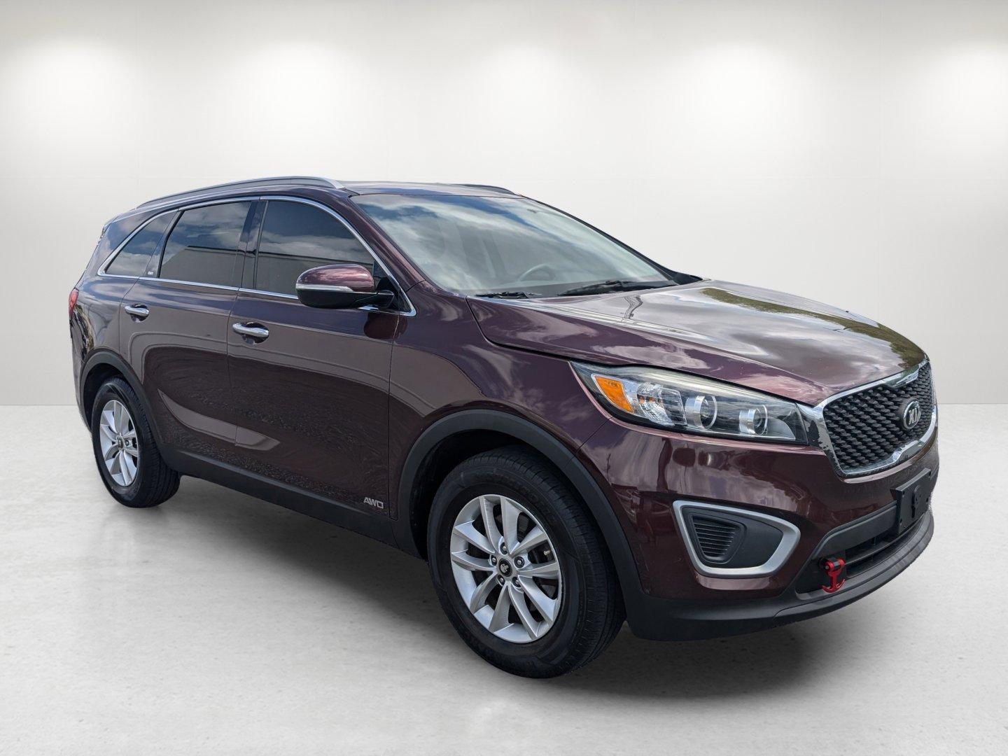 2017 /Satin Black Kia Sorento LX (5XYPGDA35HG) with an Regular Unleaded I-4 2.4 L/144 engine, 6-Speed Automatic w/OD transmission, located at 1430 Gateway Drive, Opelika, AL, 36801, (334) 239-0944, 32.637871, -85.409790 - 2017 Kia Sorento LX - Photo#2