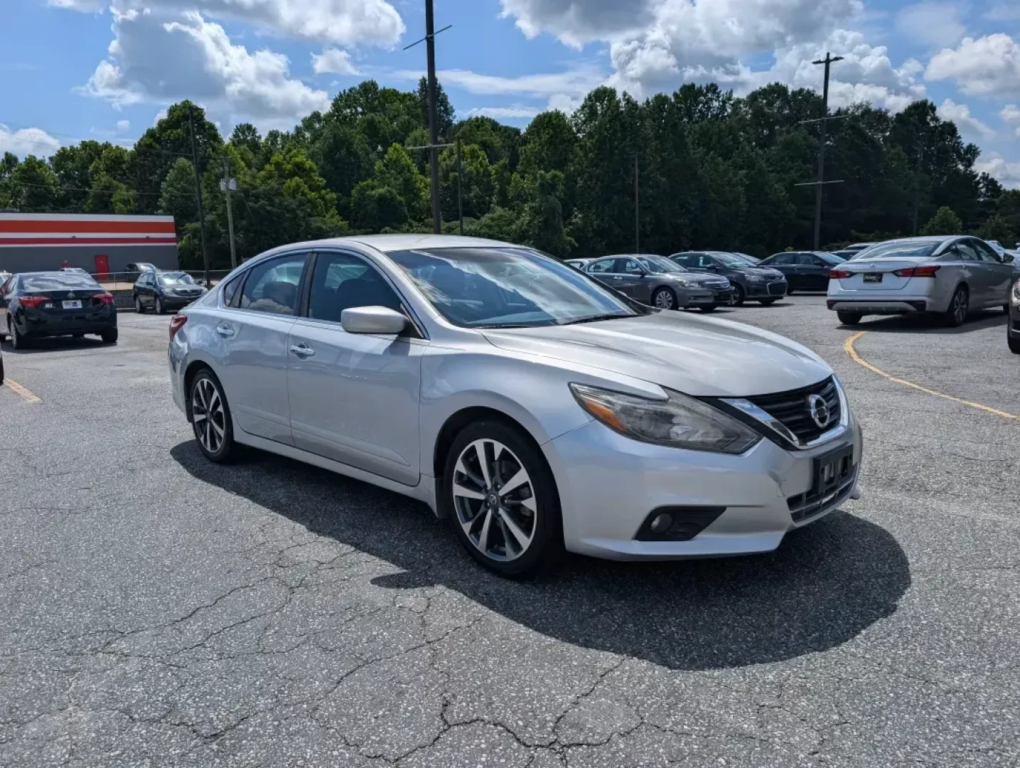 2017 /Sport Interior Nissan Altima 2.5 SR (1N4AL3AP3HC) with an Other engine, located at 3959 U.S. 80 W, Phenix City, AL, 36870, (334) 297-4885, 32.469296, -85.135185 - **Discover Your New Adventure with the 2017 Nissan Altima 2.5 SR at Gils Auto!**<br /> <br /> Are you in search of a reliable vehicle that perfectly balances style, performance, and practicality? Look no further than the 2017 Nissan Altima 2.5 SR, available now at Gils Auto in Phenix City, AL! This - Photo#2