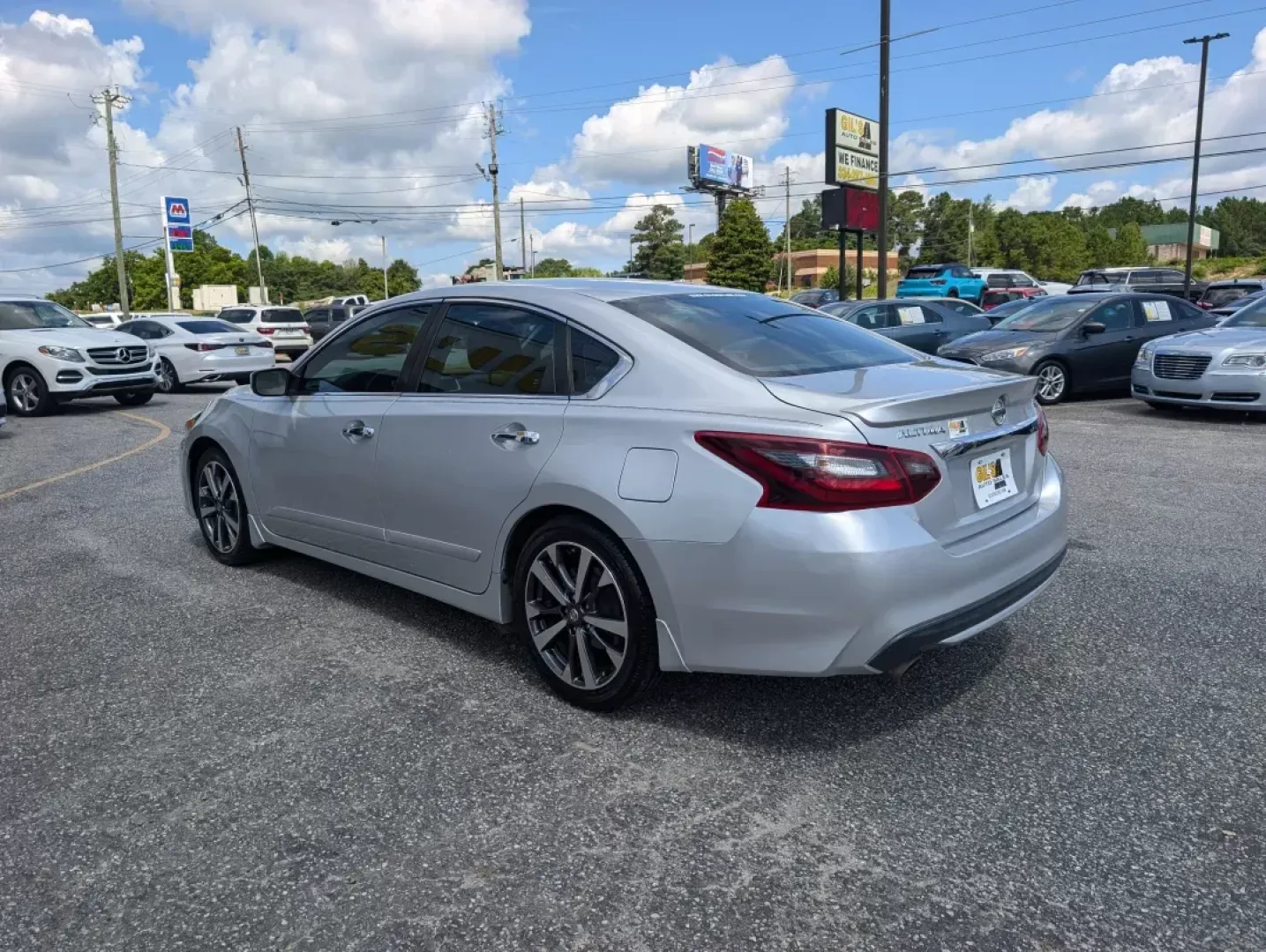 2017 /Sport Interior Nissan Altima 2.5 SR (1N4AL3AP3HC) with an Other engine, located at 3959 U.S. 80 W, Phenix City, AL, 36870, (334) 297-4885, 32.469296, -85.135185 - **Discover Your New Adventure with the 2017 Nissan Altima 2.5 SR at Gils Auto!**<br /> <br /> Are you in search of a reliable vehicle that perfectly balances style, performance, and practicality? Look no further than the 2017 Nissan Altima 2.5 SR, available now at Gils Auto in Phenix City, AL! This - Photo#6