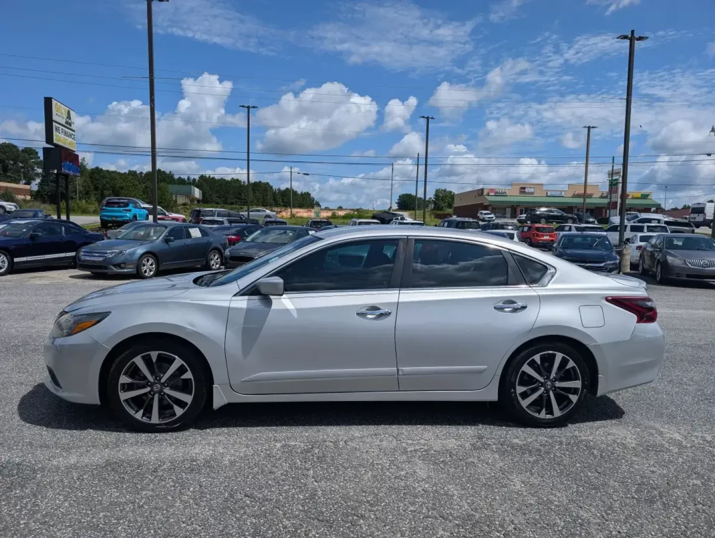 2017 /Sport Interior Nissan Altima 2.5 SR (1N4AL3AP3HC) with an Other engine, located at 3959 U.S. 80 W, Phenix City, AL, 36870, (334) 297-4885, 32.469296, -85.135185 - **Discover Your New Adventure with the 2017 Nissan Altima 2.5 SR at Gils Auto!**<br /> <br /> Are you in search of a reliable vehicle that perfectly balances style, performance, and practicality? Look no further than the 2017 Nissan Altima 2.5 SR, available now at Gils Auto in Phenix City, AL! This - Photo#7