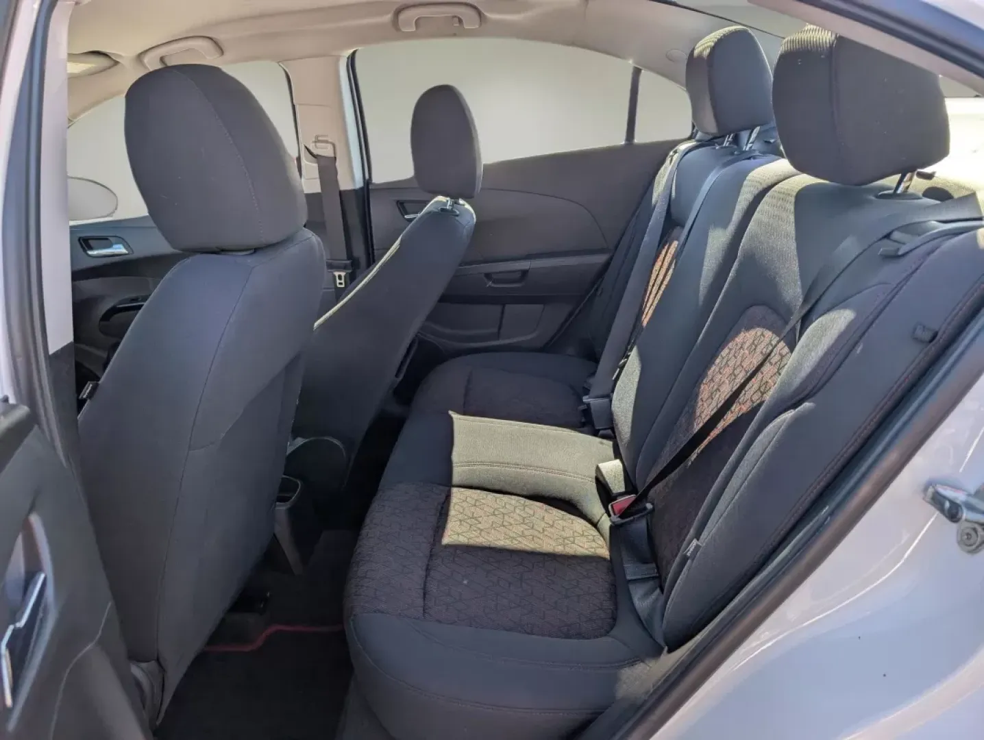 2018 /Jet Black Chevrolet Sonic LT (1G1JD5SHXJ4) with an Other engine, located at 804 22nd Ave, Phenix City, AL, 36870, (334) 297-1860, 32.484749, -85.024475 - **Discover Your Perfect Commute Companion: 2018 Chevrolet Sonic LT at Gils Auto, Phenix City**<br /> <br /> Are you ready to elevate your daily drive? The 2018 Chevrolet Sonic LT is the ideal choice for those who crave a reliable, fuel-efficient sedan that doesn't compromise on style or features. Wh - Photo#10