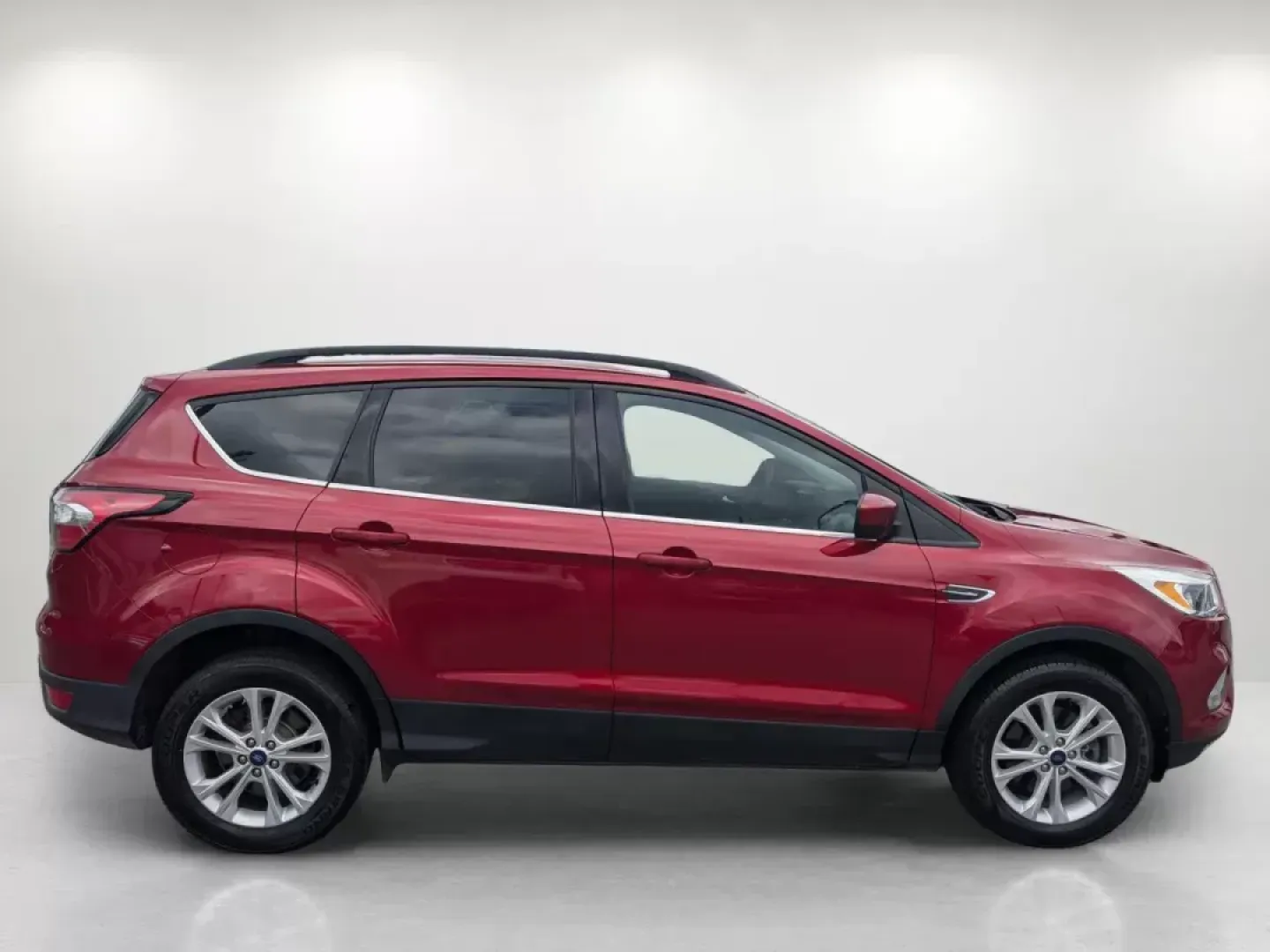 2018 Red Ford Escape SE (1FMCU9GD1JU) with an Other engine, located at 1430 Gateway Drive, Opelika, AL, 36801, (334) 239-0944, 32.637871, -85.409790 - **Adventure Awaits: Discover the 2018 Ford Escape SE at Gils Auto - Opelika**<br /> <br /> Are you ready to elevate your lifestyle with a dependable SUV that perfectly balances style and functionality? Look no further than the 2018 Ford Escape SE, available now at Gils Auto, your trusted Buy Here Pa - Photo#3