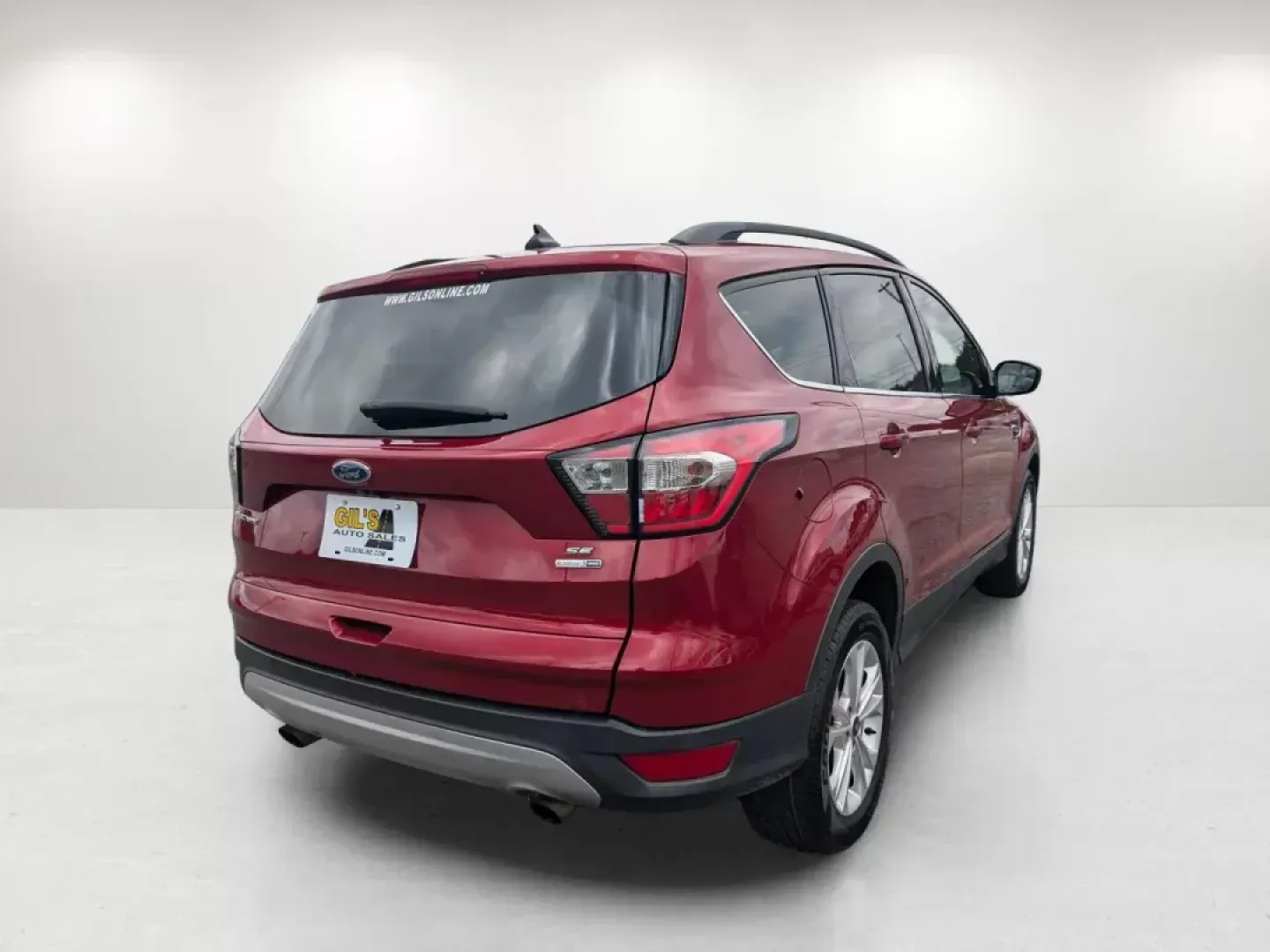 2018 Red Ford Escape SE (1FMCU9GD1JU) with an Other engine, located at 1430 Gateway Drive, Opelika, AL, 36801, (334) 239-0944, 32.637871, -85.409790 - **Adventure Awaits: Discover the 2018 Ford Escape SE at Gils Auto - Opelika**<br /> <br /> Are you ready to elevate your lifestyle with a dependable SUV that perfectly balances style and functionality? Look no further than the 2018 Ford Escape SE, available now at Gils Auto, your trusted Buy Here Pa - Photo#4