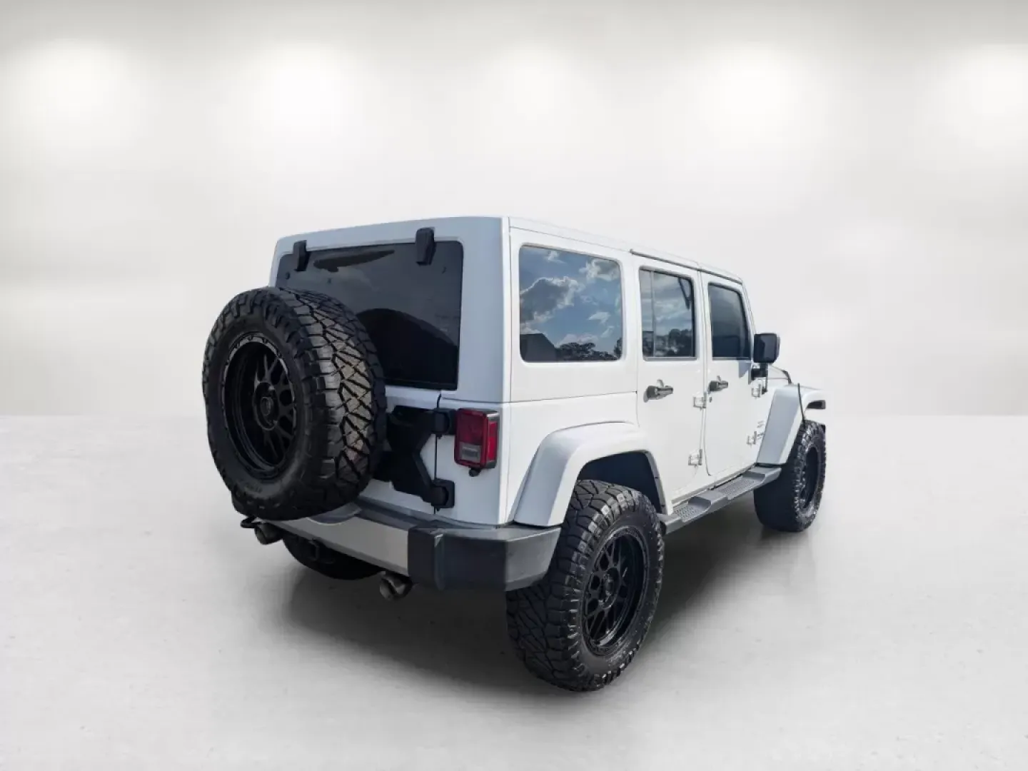 2018 /Black Jeep Wrangler Sahara (1C4BJWEG4JL) with an Other engine, located at 1430 Gateway Drive, Opelika, AL, 36801, (334) 239-0944, 32.637871, -85.409790 - **Adventure Awaits: 2018 Jeep Wrangler Sahara at Gils Auto**<br /> <br /> Are you ready to embark on your next adventure? Whether you're planning a weekend getaway to the stunning landscapes of Lake Martin or navigating through the vibrant streets of Phenix City, this 2018 Jeep Wrangler Sahara is yo - Photo#4