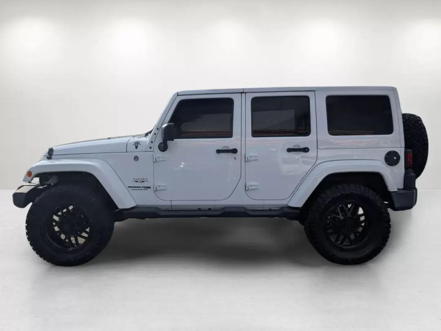 2018 /Black Jeep Wrangler Sahara (1C4BJWEG4JL) with an Other engine, located at 1430 Gateway Drive, Opelika, AL, 36801, (334) 239-0944, 32.637871, -85.409790 - **Adventure Awaits: 2018 Jeep Wrangler Sahara at Gils Auto**<br /> <br /> Are you ready to embark on your next adventure? Whether you're planning a weekend getaway to the stunning landscapes of Lake Martin or navigating through the vibrant streets of Phenix City, this 2018 Jeep Wrangler Sahara is yo - Photo#7