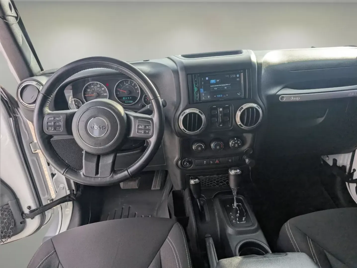 2018 /Black Jeep Wrangler Sahara (1C4BJWEG4JL) with an Other engine, located at 1430 Gateway Drive, Opelika, AL, 36801, (334) 239-0944, 32.637871, -85.409790 - **Adventure Awaits: 2018 Jeep Wrangler Sahara at Gils Auto**<br /> <br /> Are you ready to embark on your next adventure? Whether you're planning a weekend getaway to the stunning landscapes of Lake Martin or navigating through the vibrant streets of Phenix City, this 2018 Jeep Wrangler Sahara is yo - Photo#11