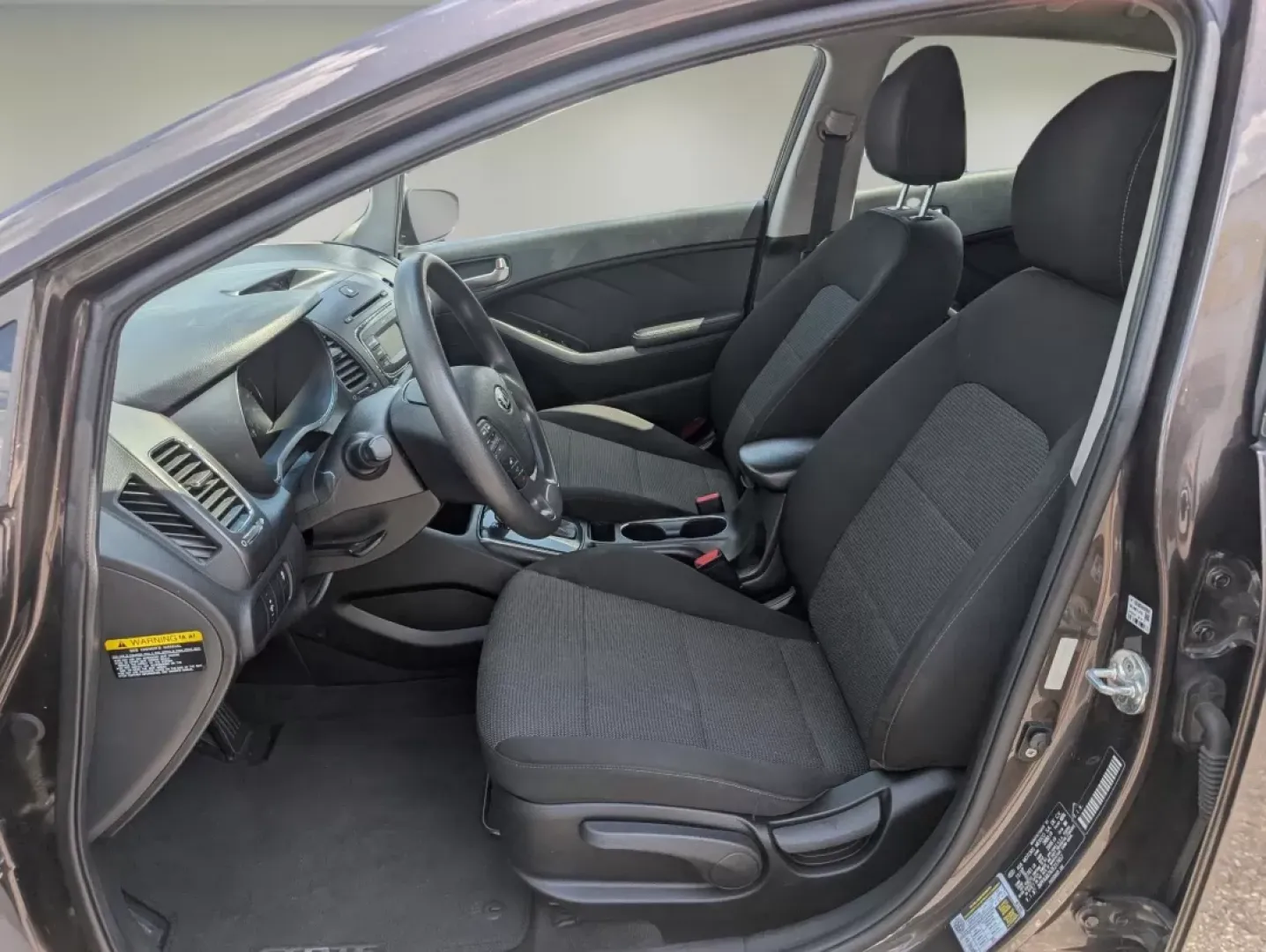 2018 /Black Kia Forte LX (3KPFK4A7XJE) with an Other engine, located at 1430 Gateway Drive, Opelika, AL, 36801, (334) 239-0944, 32.637871, -85.409790 - Are you on the hunt for a reliable vehicle that perfectly balances comfort, style, and affordability? Look no further than this stunning 2018 Kia Forte LX, available now at Gils Auto in Phenix City, Alabama. Whether you're commuting to work, running errands, or planning a weekend getaway, this sedan - Photo#9