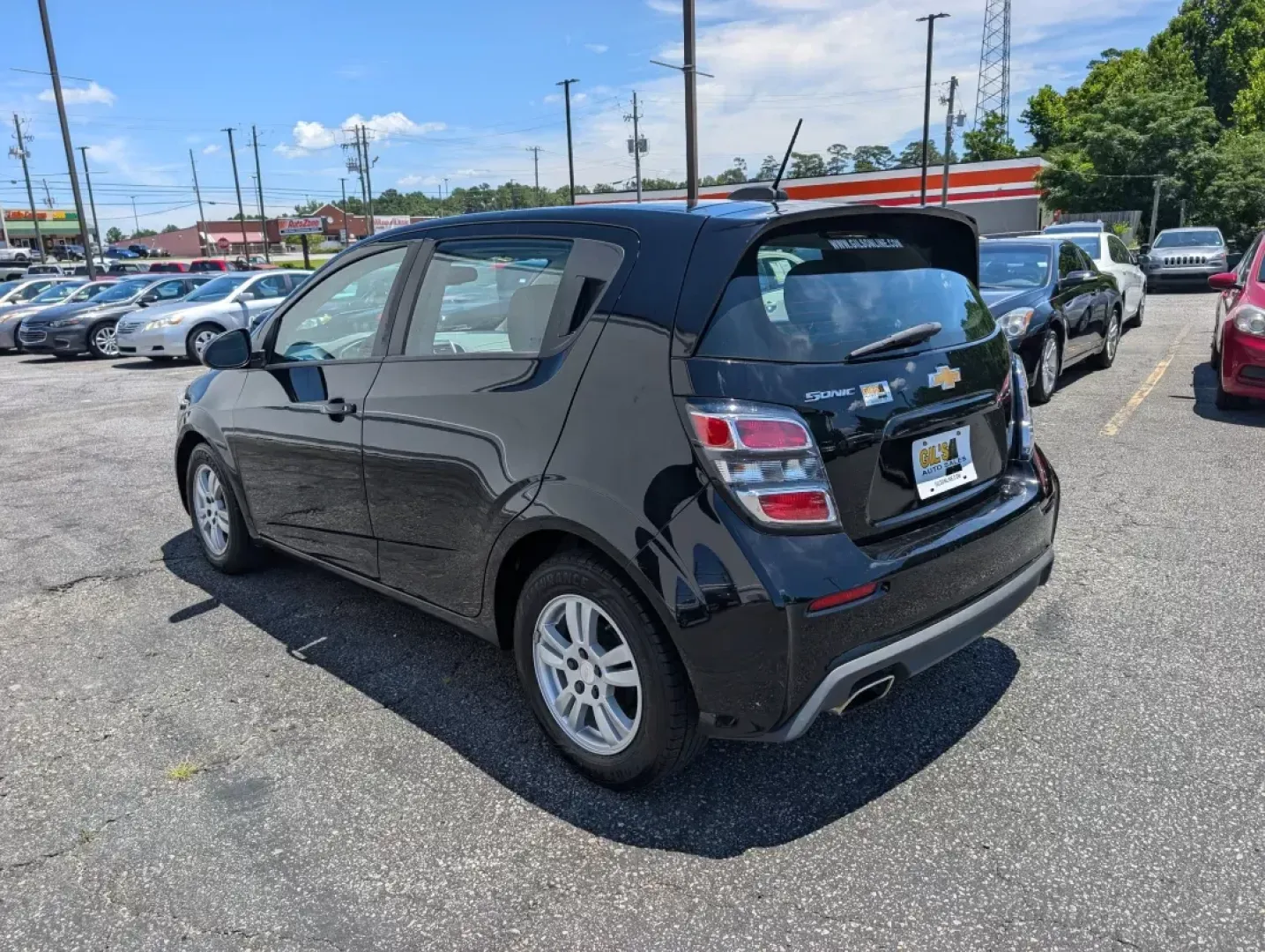 2019 /Jet Black/Dark Titanium Chevrolet Sonic LT (1G1JG6SB9K4) with an Other engine, located at 5115 14th Ave., Columbus, GA, 31904, (706) 323-0345, 32.511494, -84.971046 - **Discover Your Perfect Companion for Daily Adventures: The 2019 Chevrolet Sonic LT Hatchback at Gils Auto!**<br /> <br /> Looking for a versatile and stylish hatchback that fits seamlessly into your busy lifestyle? The 2019 Chevrolet Sonic LT is your answer! Perfect for urban commuters, families on - Photo#6