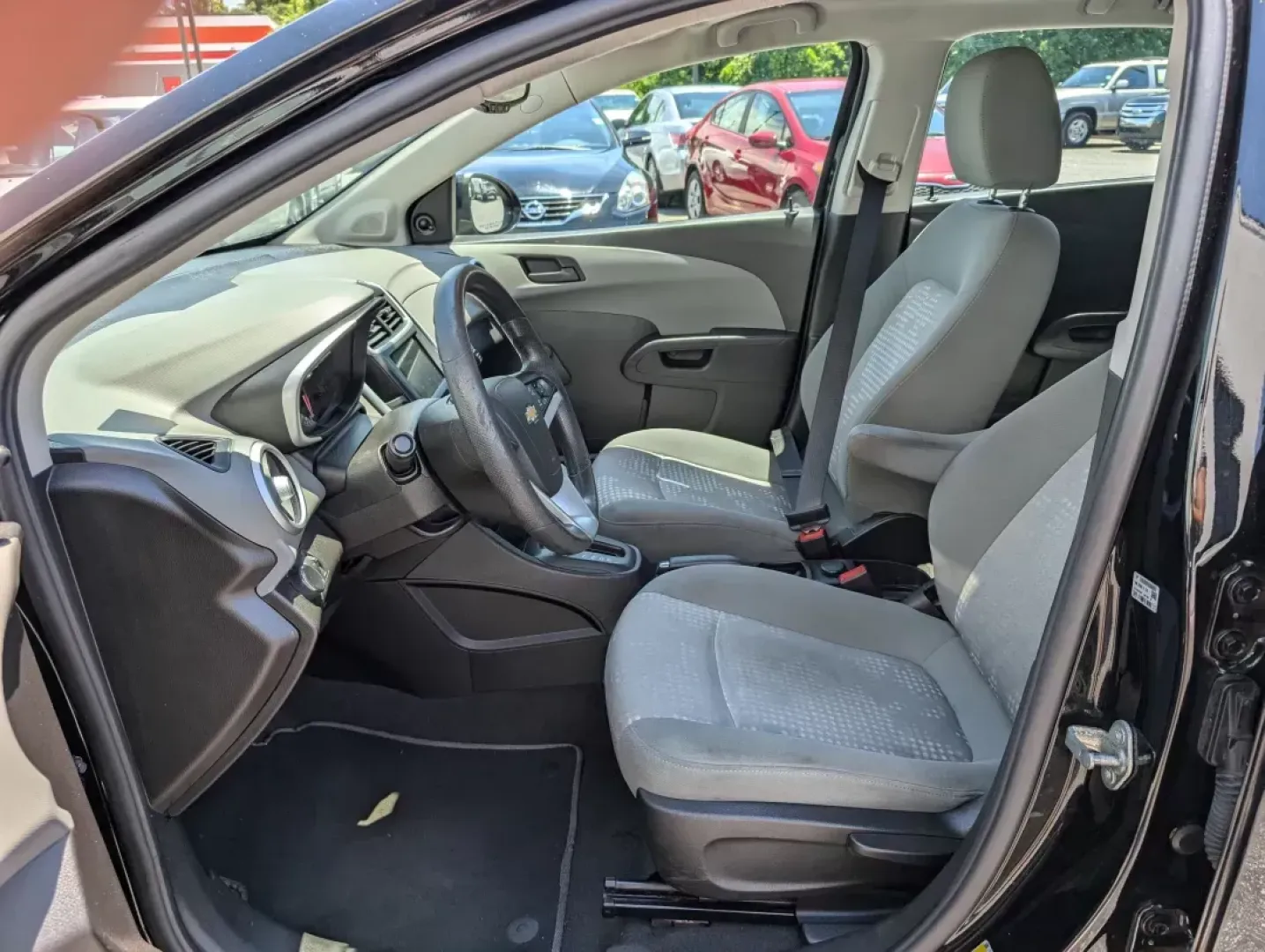 2019 /Jet Black/Dark Titanium Chevrolet Sonic LT (1G1JG6SB9K4) with an Other engine, located at 5115 14th Ave., Columbus, GA, 31904, (706) 323-0345, 32.511494, -84.971046 - **Discover Your Perfect Companion for Daily Adventures: The 2019 Chevrolet Sonic LT Hatchback at Gils Auto!**<br /> <br /> Looking for a versatile and stylish hatchback that fits seamlessly into your busy lifestyle? The 2019 Chevrolet Sonic LT is your answer! Perfect for urban commuters, families on - Photo#8