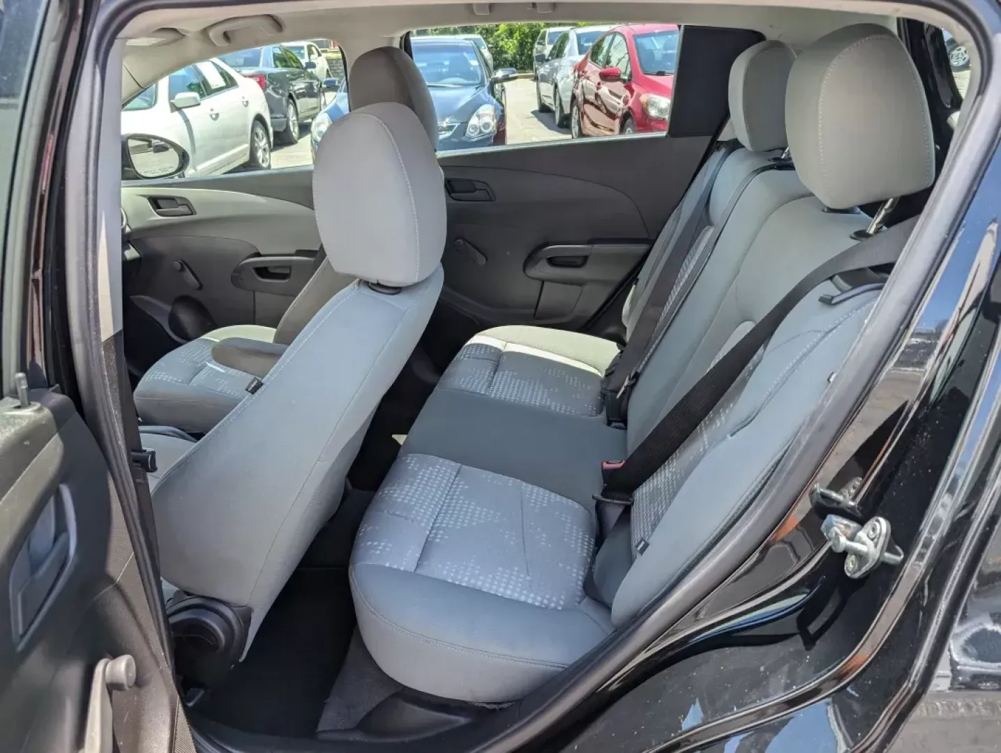 2019 /Jet Black/Dark Titanium Chevrolet Sonic LT (1G1JG6SB9K4) with an Other engine, located at 5115 14th Ave., Columbus, GA, 31904, (706) 323-0345, 32.511494, -84.971046 - **Discover Your Perfect Companion for Daily Adventures: The 2019 Chevrolet Sonic LT Hatchback at Gils Auto!**<br /> <br /> Looking for a versatile and stylish hatchback that fits seamlessly into your busy lifestyle? The 2019 Chevrolet Sonic LT is your answer! Perfect for urban commuters, families on - Photo#9