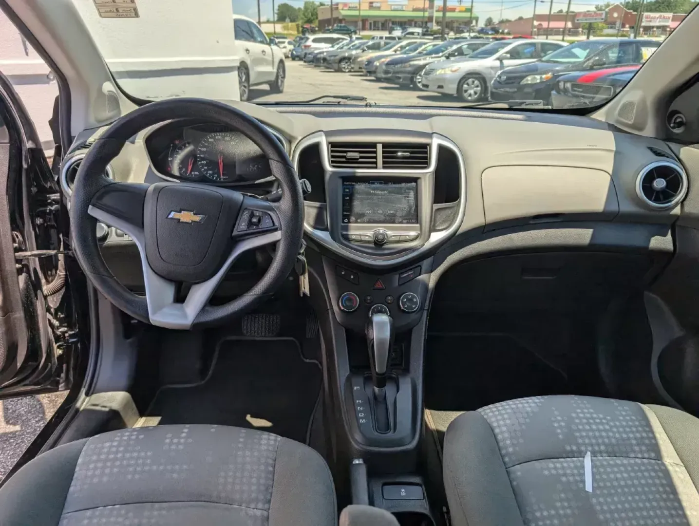2019 /Jet Black/Dark Titanium Chevrolet Sonic LT (1G1JG6SB9K4) with an Other engine, located at 5115 14th Ave., Columbus, GA, 31904, (706) 323-0345, 32.511494, -84.971046 - **Discover Your Perfect Companion for Daily Adventures: The 2019 Chevrolet Sonic LT Hatchback at Gils Auto!**<br /> <br /> Looking for a versatile and stylish hatchback that fits seamlessly into your busy lifestyle? The 2019 Chevrolet Sonic LT is your answer! Perfect for urban commuters, families on - Photo#10