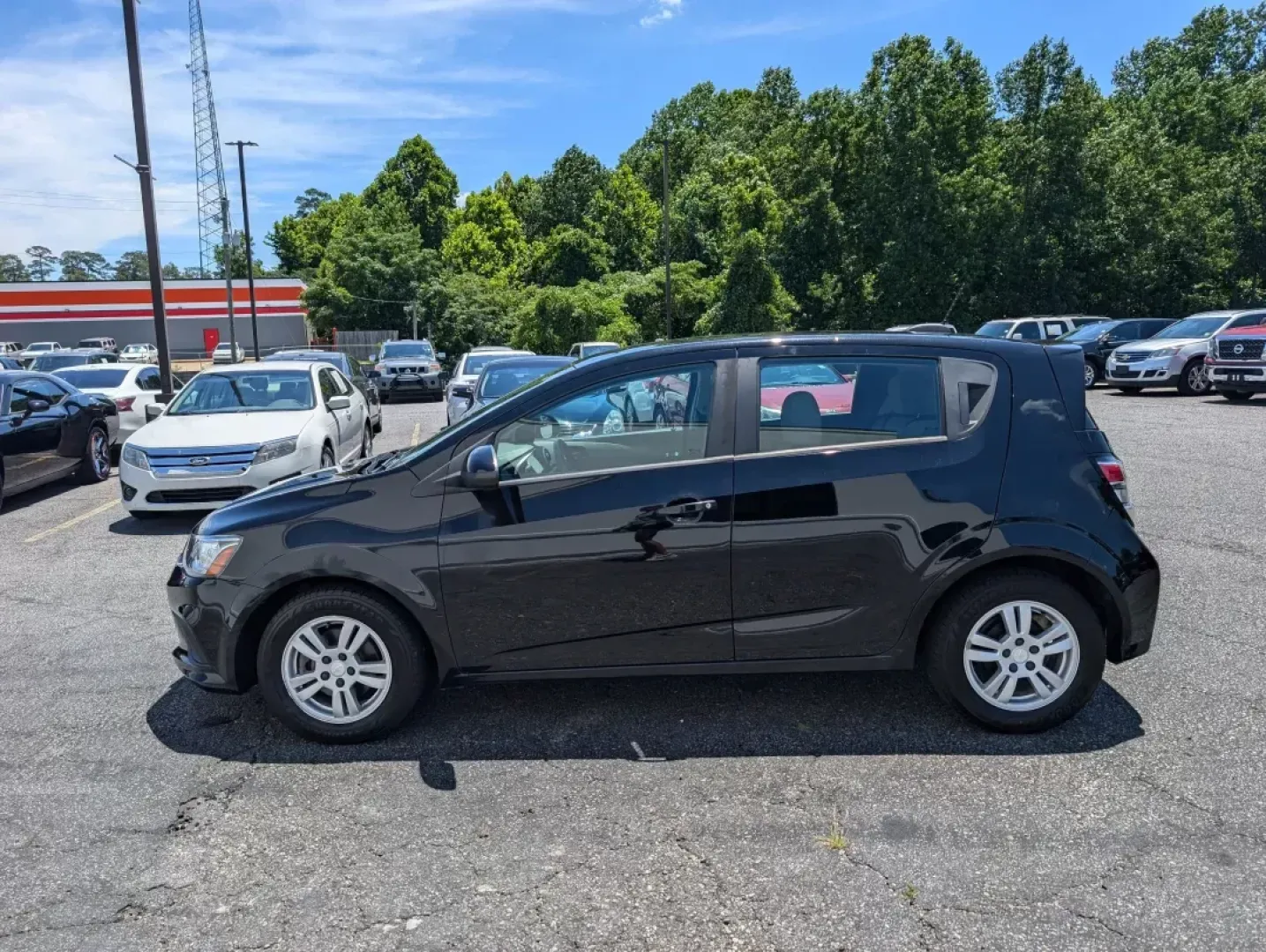 2019 /Jet Black/Dark Titanium Chevrolet Sonic LT (1G1JG6SB9K4) with an Other engine, located at 5115 14th Ave., Columbus, GA, 31904, (706) 323-0345, 32.511494, -84.971046 - **Discover Your Perfect Companion for Daily Adventures: The 2019 Chevrolet Sonic LT Hatchback at Gils Auto!**<br /> <br /> Looking for a versatile and stylish hatchback that fits seamlessly into your busy lifestyle? The 2019 Chevrolet Sonic LT is your answer! Perfect for urban commuters, families on - Photo#15